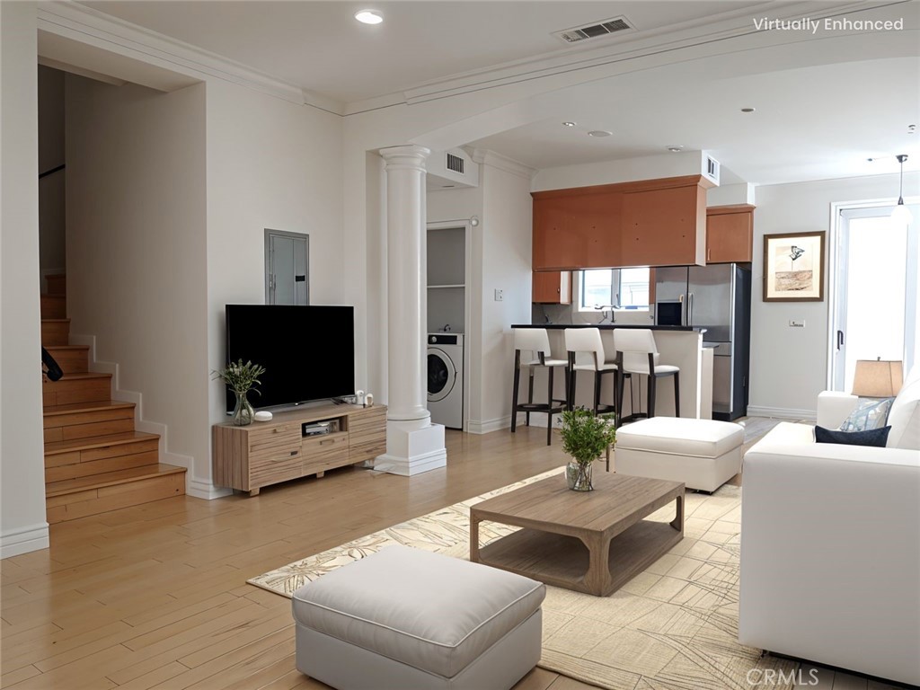 66 Allen Avenue, Unit 3 Pasadena, CA 91106 - Photo 8 of 25 a living room with furniture and a flat screen tv