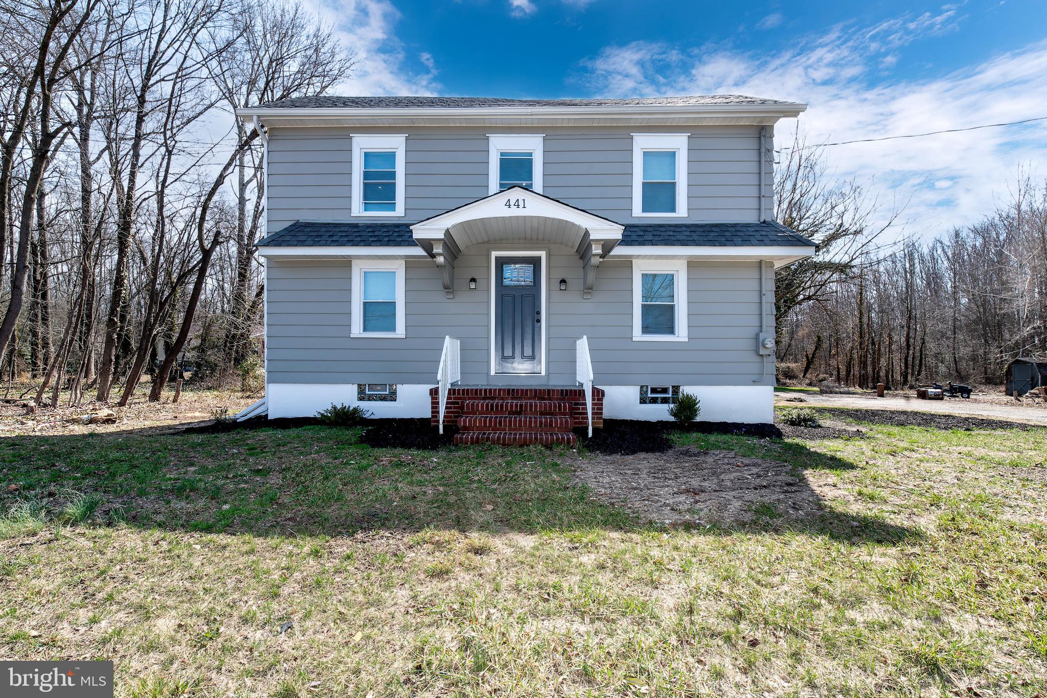 441 Harding Highway Pittsgrove, NJ 08318 - Photo 1 of 61 a front view of a house with a yard