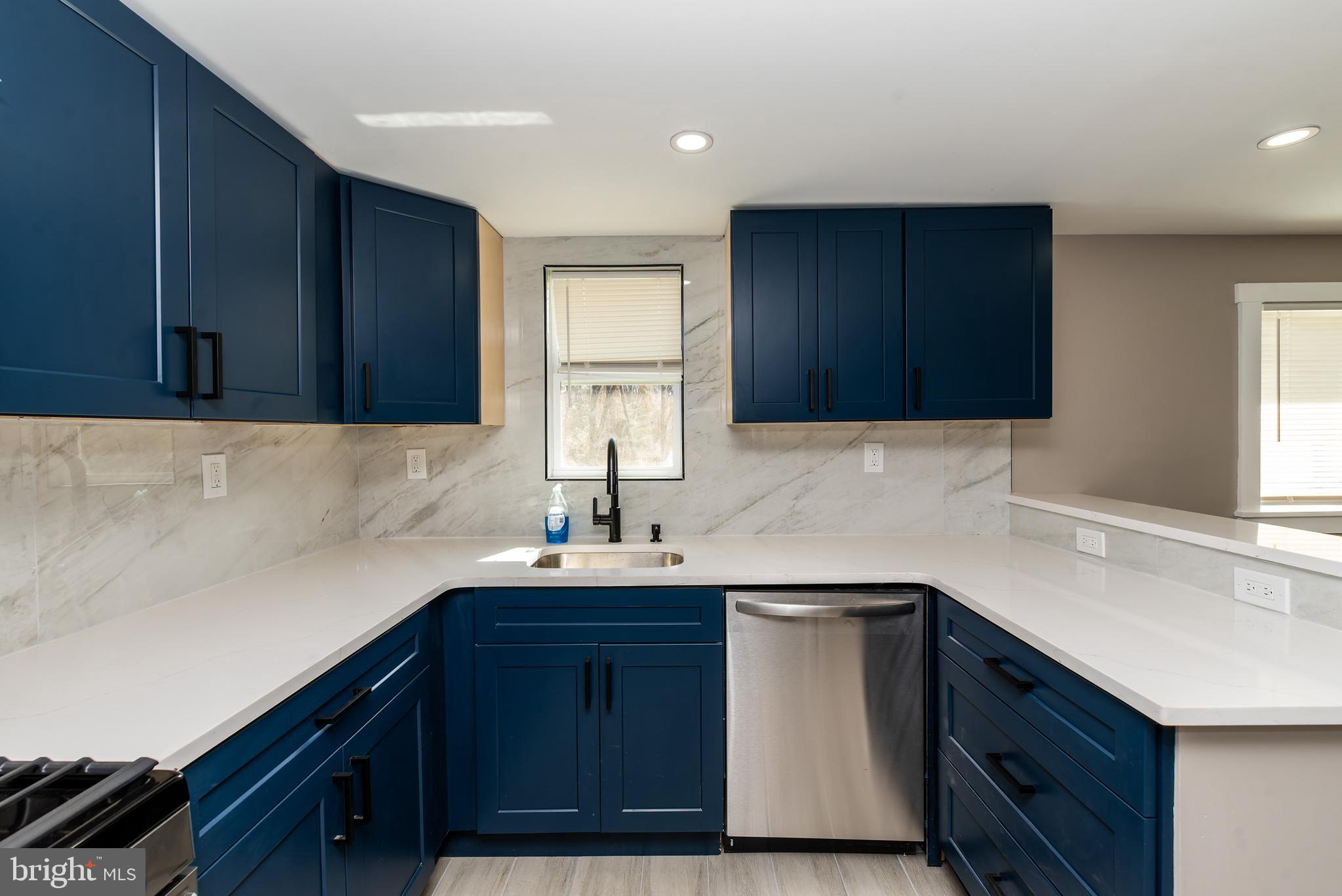 441 Harding Highway Pittsgrove, NJ 08318 - Photo 14 of 61 a kitchen with a sink cabinets and window