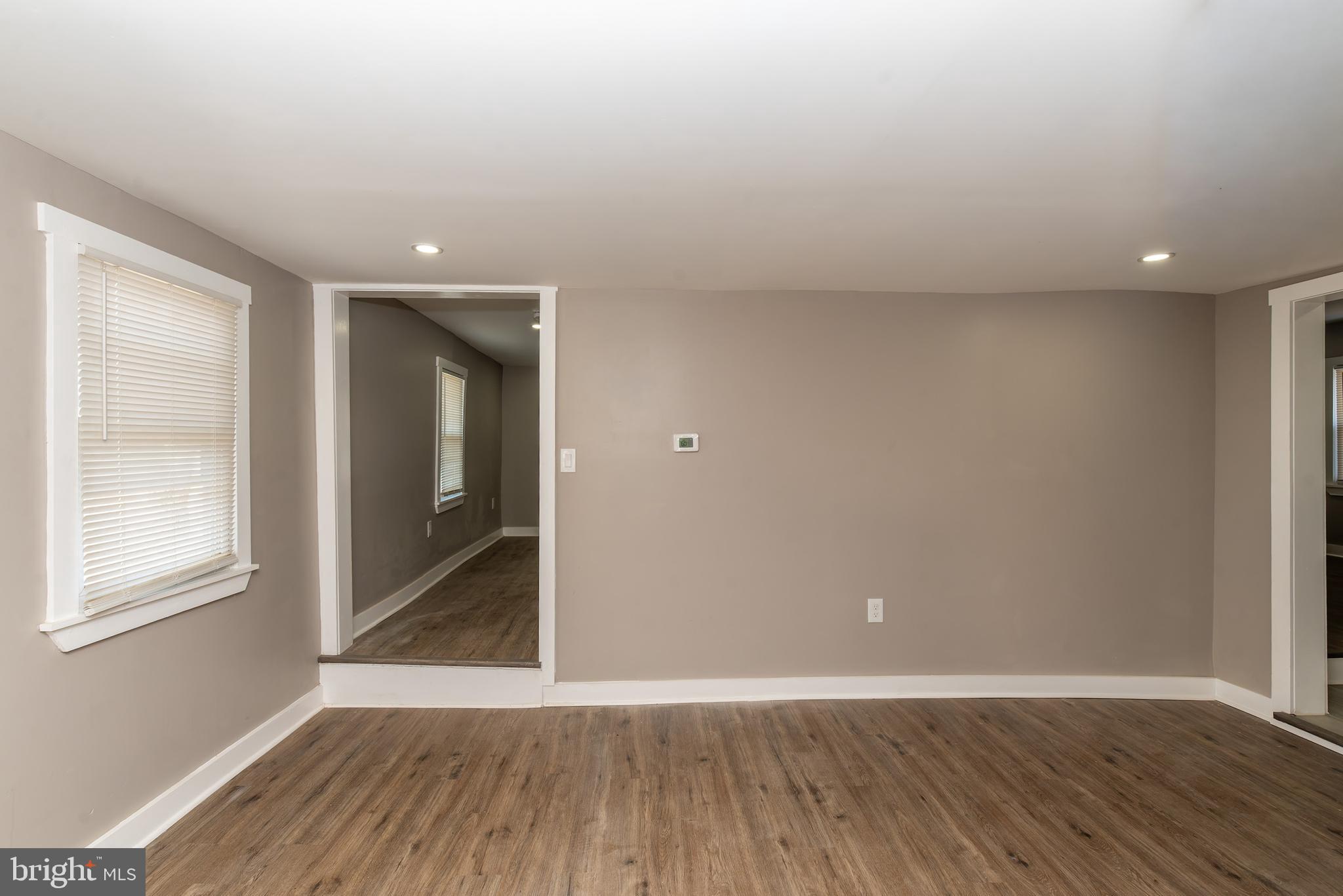 441 Harding Highway Pittsgrove, NJ 08318 - Photo 18 of 61 wooden floor in an empty room with a window