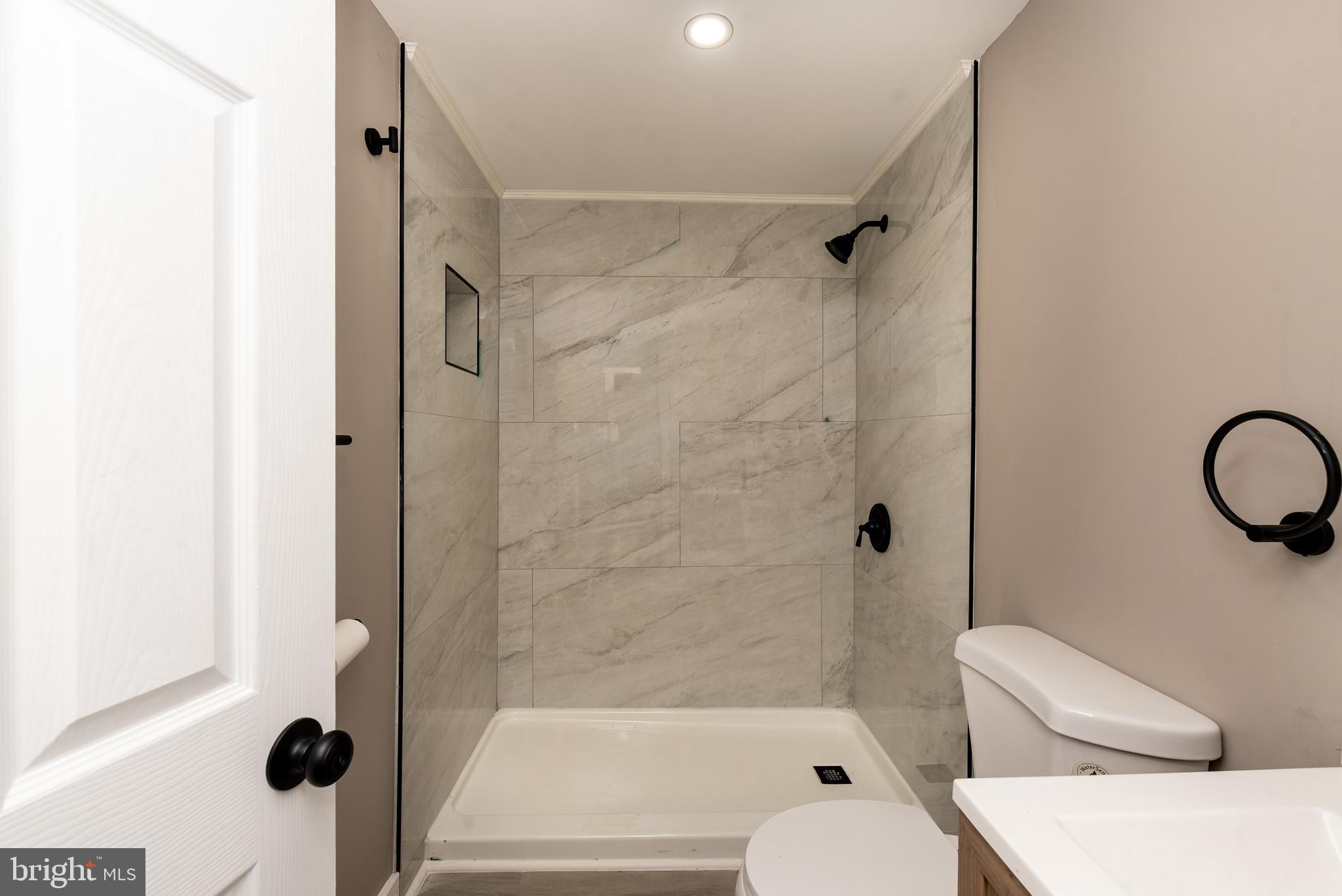 441 Harding Highway Pittsgrove, NJ 08318 - Photo 21 of 61 a bathroom with a toilet bathtub and shower