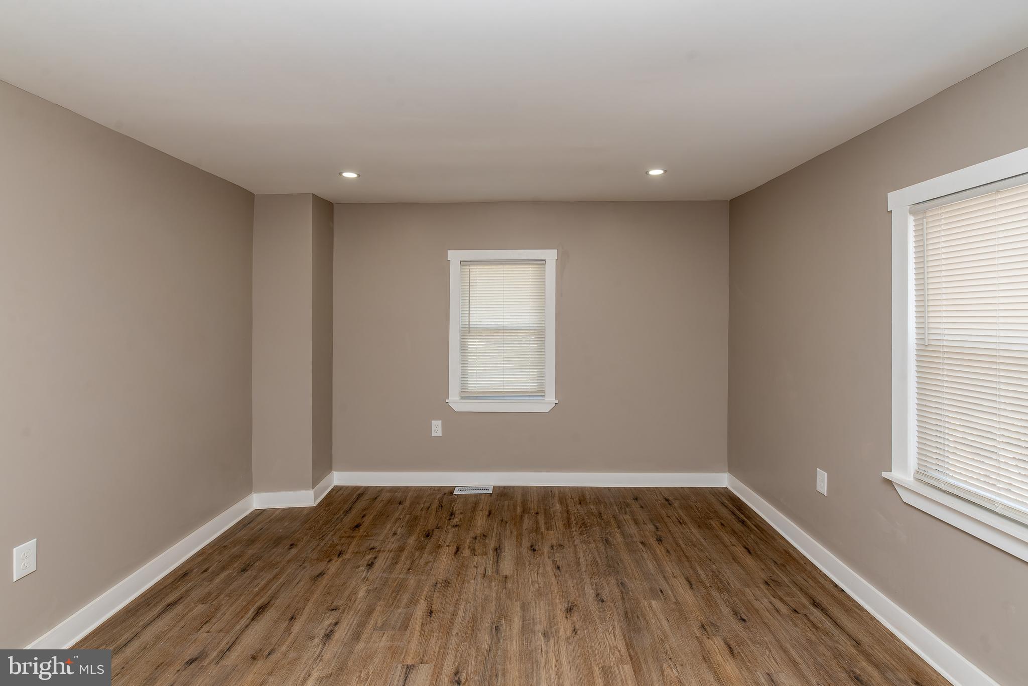441 Harding Highway Pittsgrove, NJ 08318 - Photo 24 of 61 a view of room with window and wooden floor