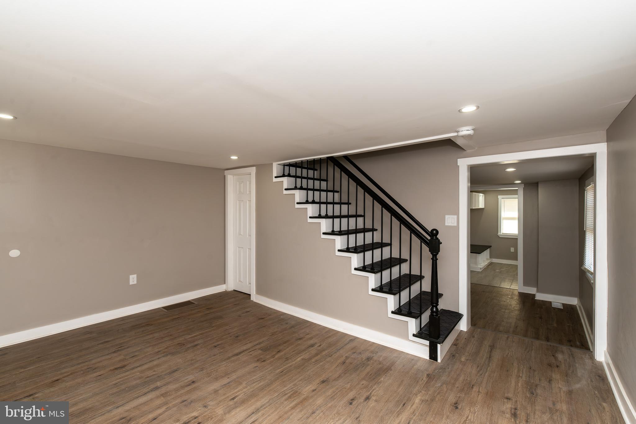 441 Harding Highway Pittsgrove, NJ 08318 - Photo 27 of 61 a view of a hallway with wooden floor and stairs