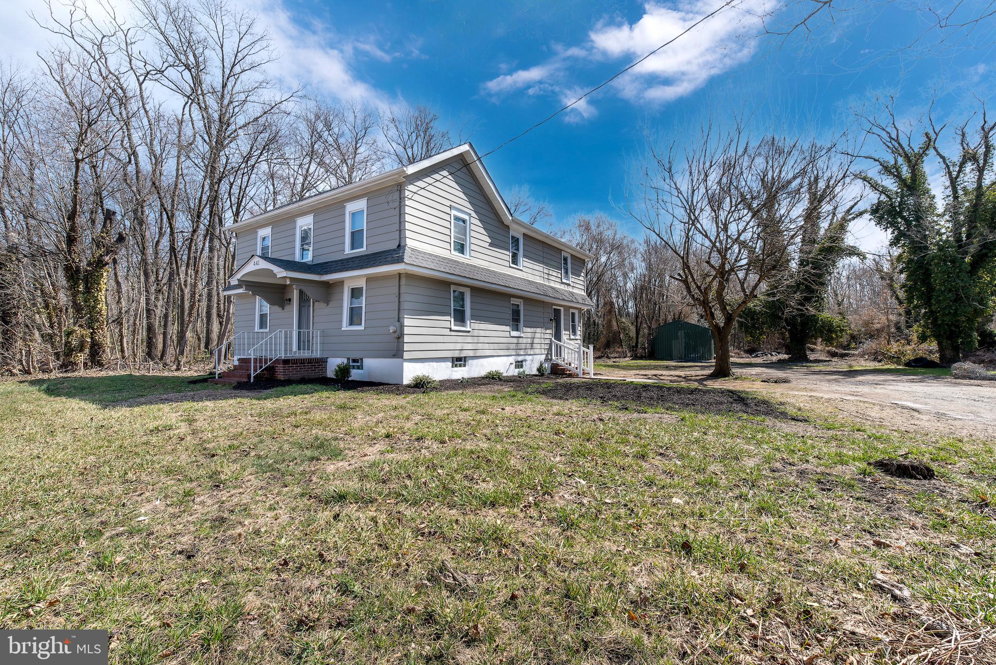 441 Harding Highway Pittsgrove, NJ 08318 - Photo 3 of 61 a front view of a house with a yard