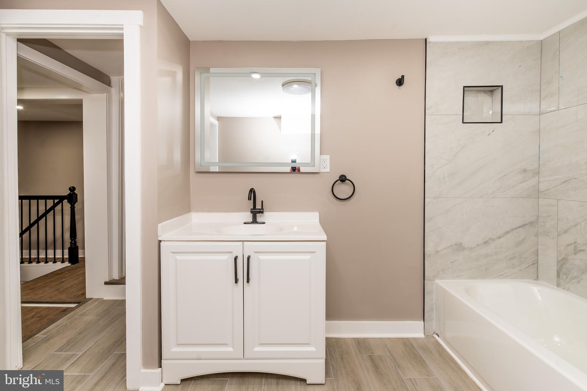 441 Harding Highway Pittsgrove, NJ 08318 - Photo 31 of 61 a bathroom with a sink a toilet and shower