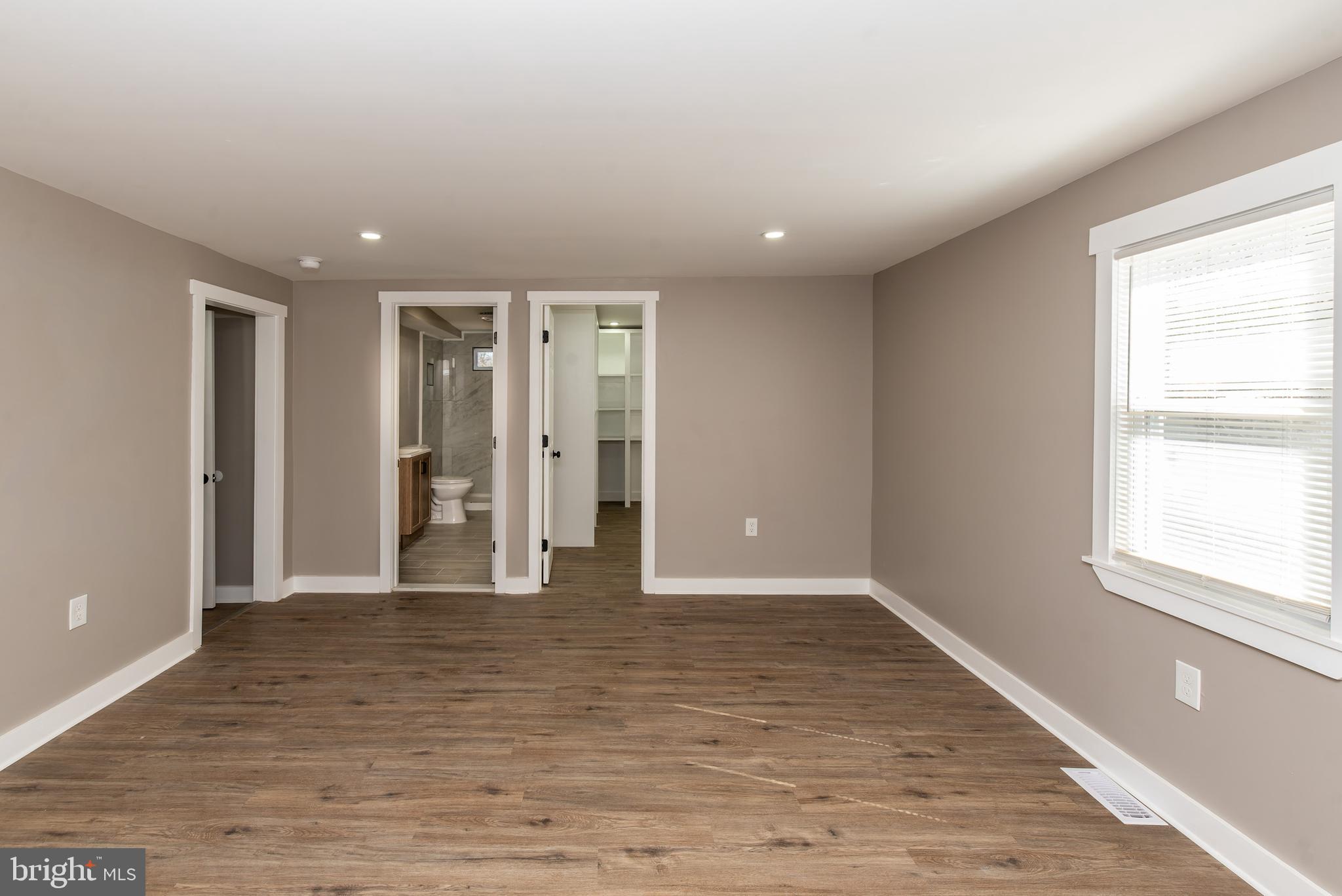 441 Harding Highway Pittsgrove, NJ 08318 - Photo 34 of 61 a view of an empty room with wooden floor and window