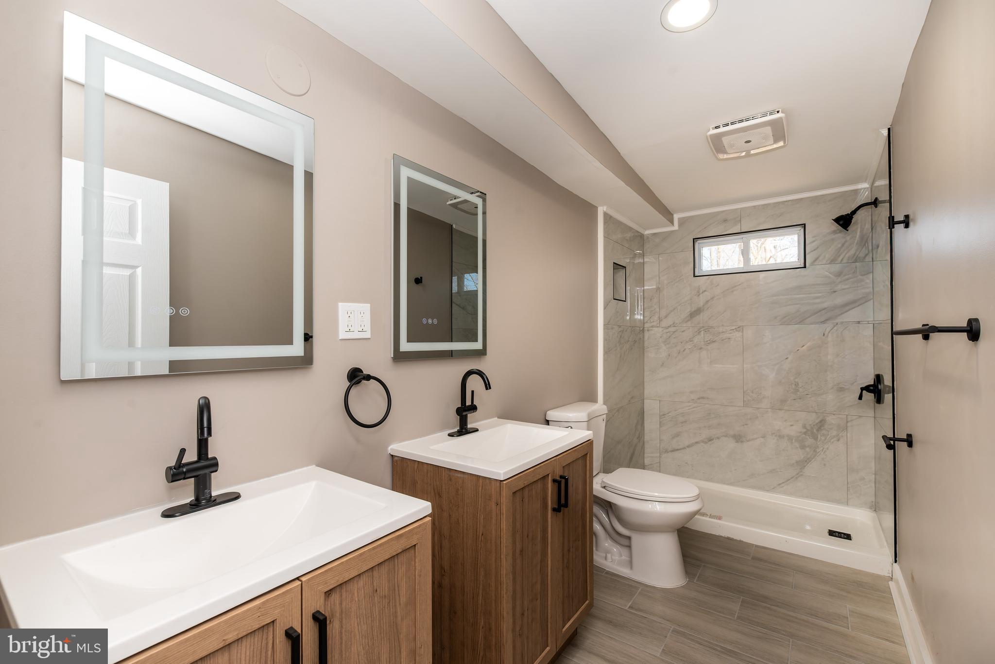 441 Harding Highway Pittsgrove, NJ 08318 - Photo 35 of 61 a bathroom with a sink toilet and shower