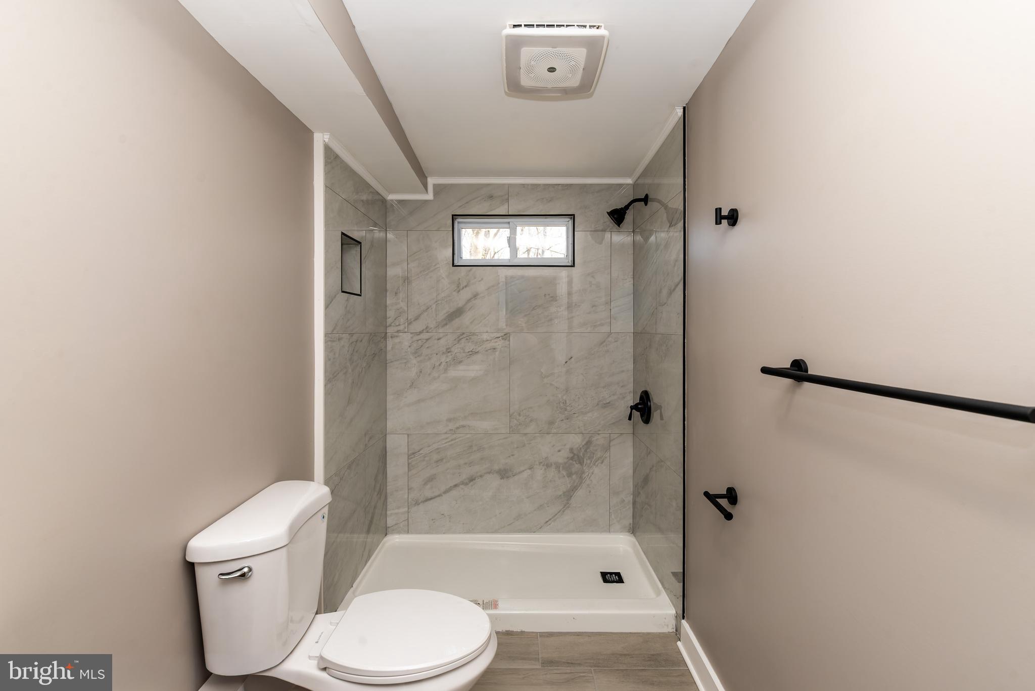 441 Harding Highway Pittsgrove, NJ 08318 - Photo 36 of 61 a bathroom with a toilet and a shower