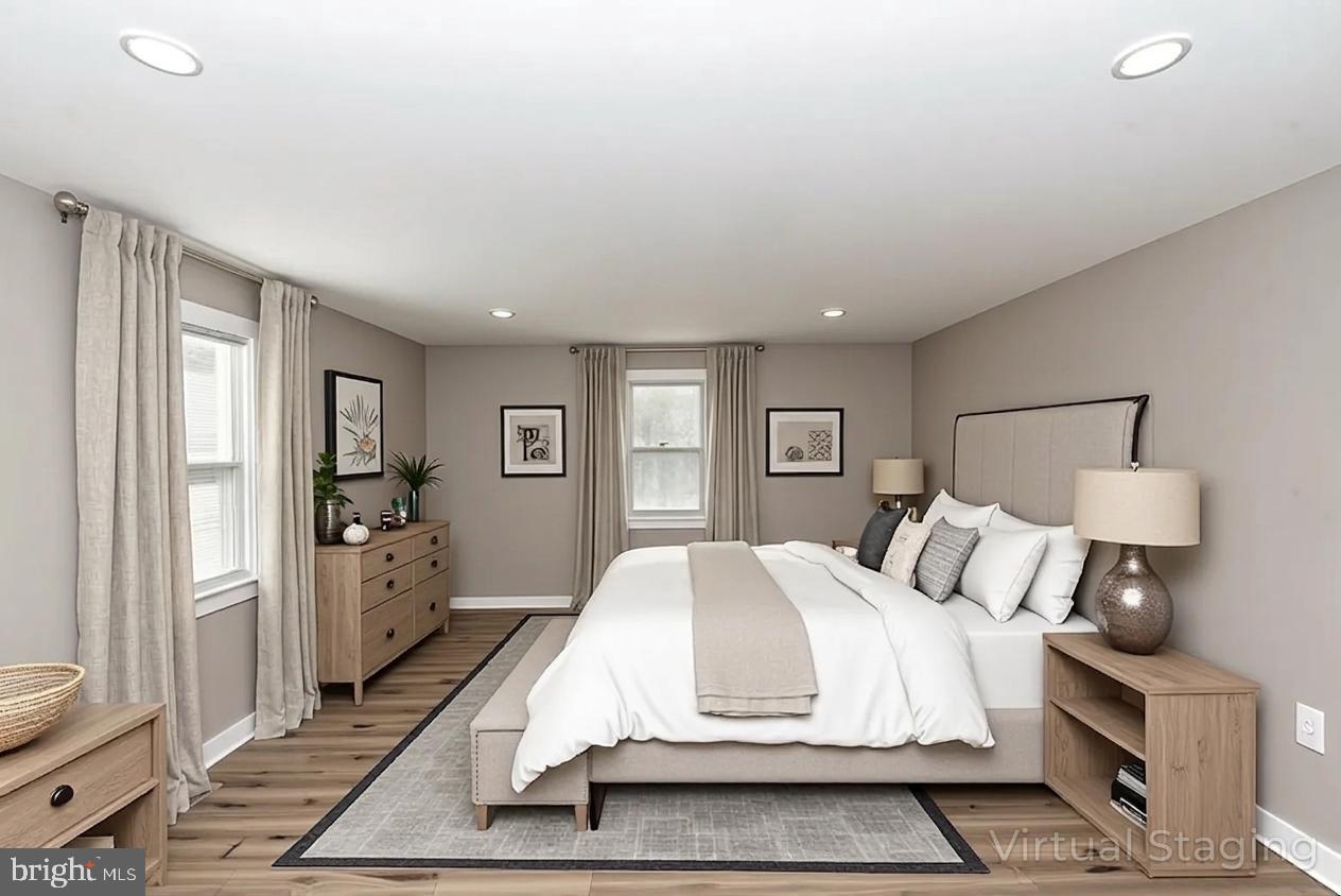 441 Harding Highway Pittsgrove, NJ 08318 - Photo 39 of 61 a bedroom with a large bed and a tv