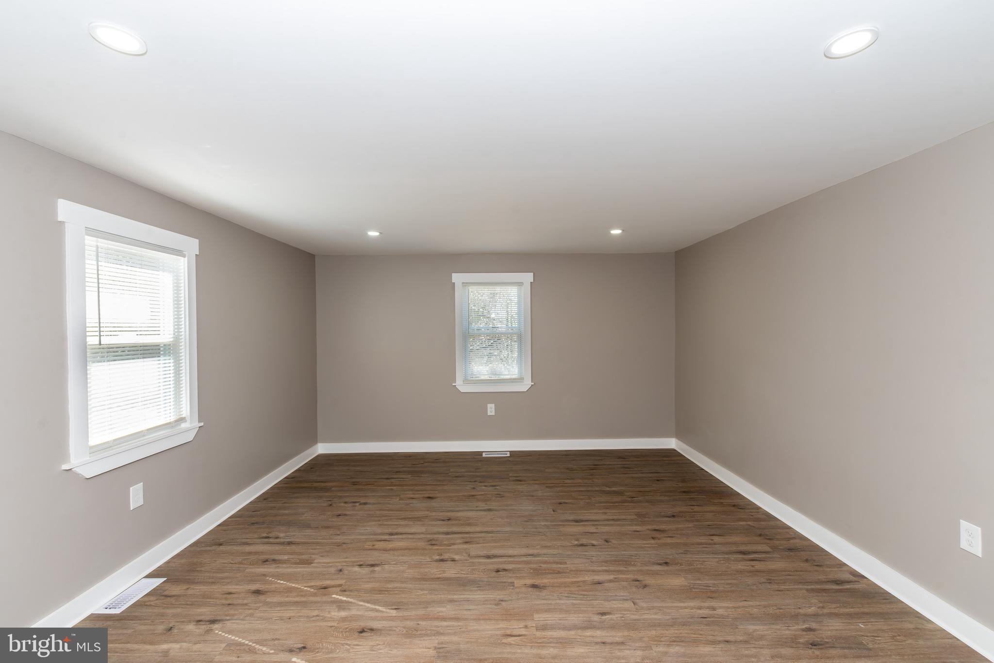 441 Harding Highway Pittsgrove, NJ 08318 - Photo 40 of 61 wooden floor in an empty room with a window