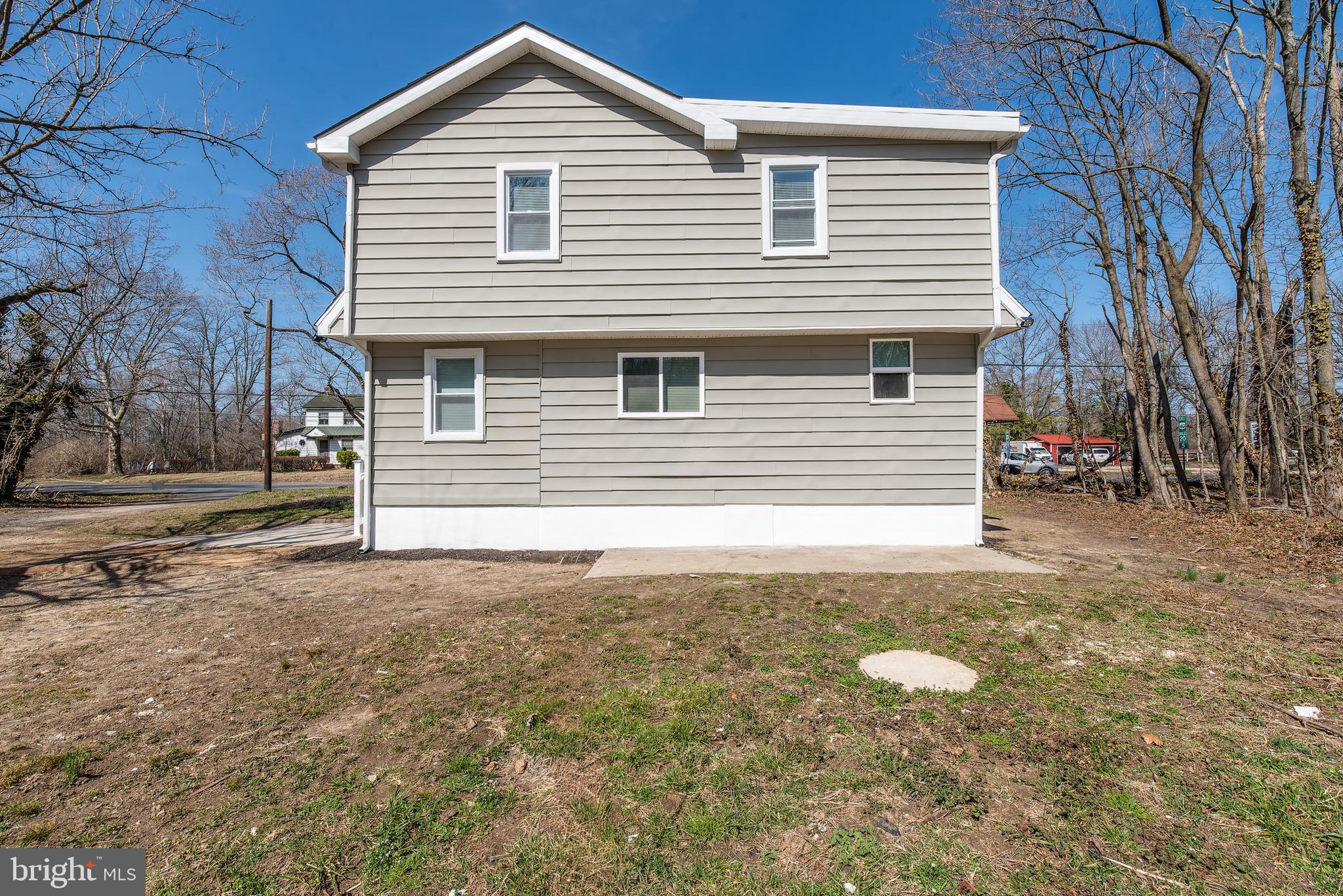 441 Harding Highway Pittsgrove, NJ 08318 - Photo 4 of 61 a front view of a house with a yard