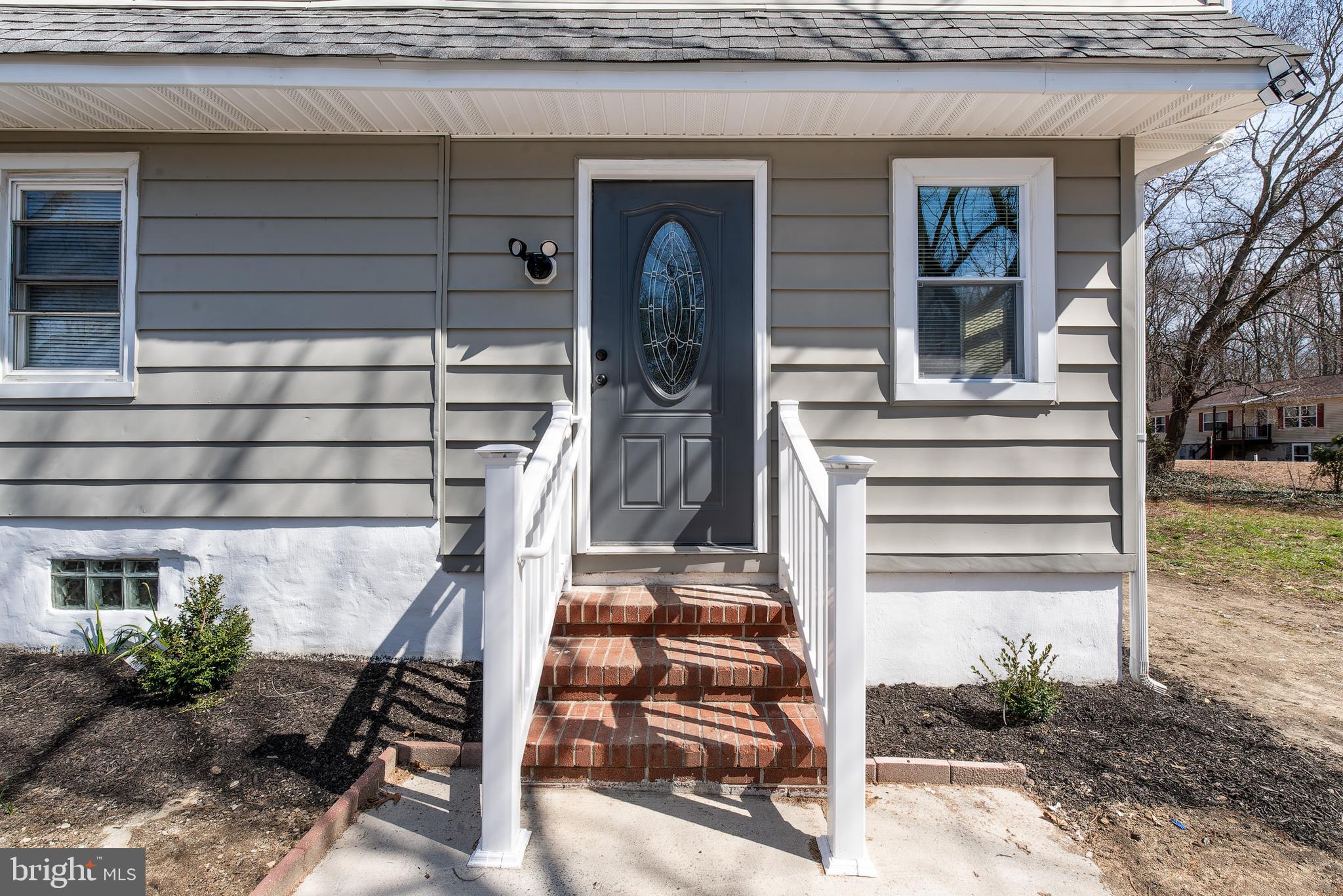 441 Harding Highway Pittsgrove, NJ 08318 - Photo 6 of 61 a front view of a house with a porch