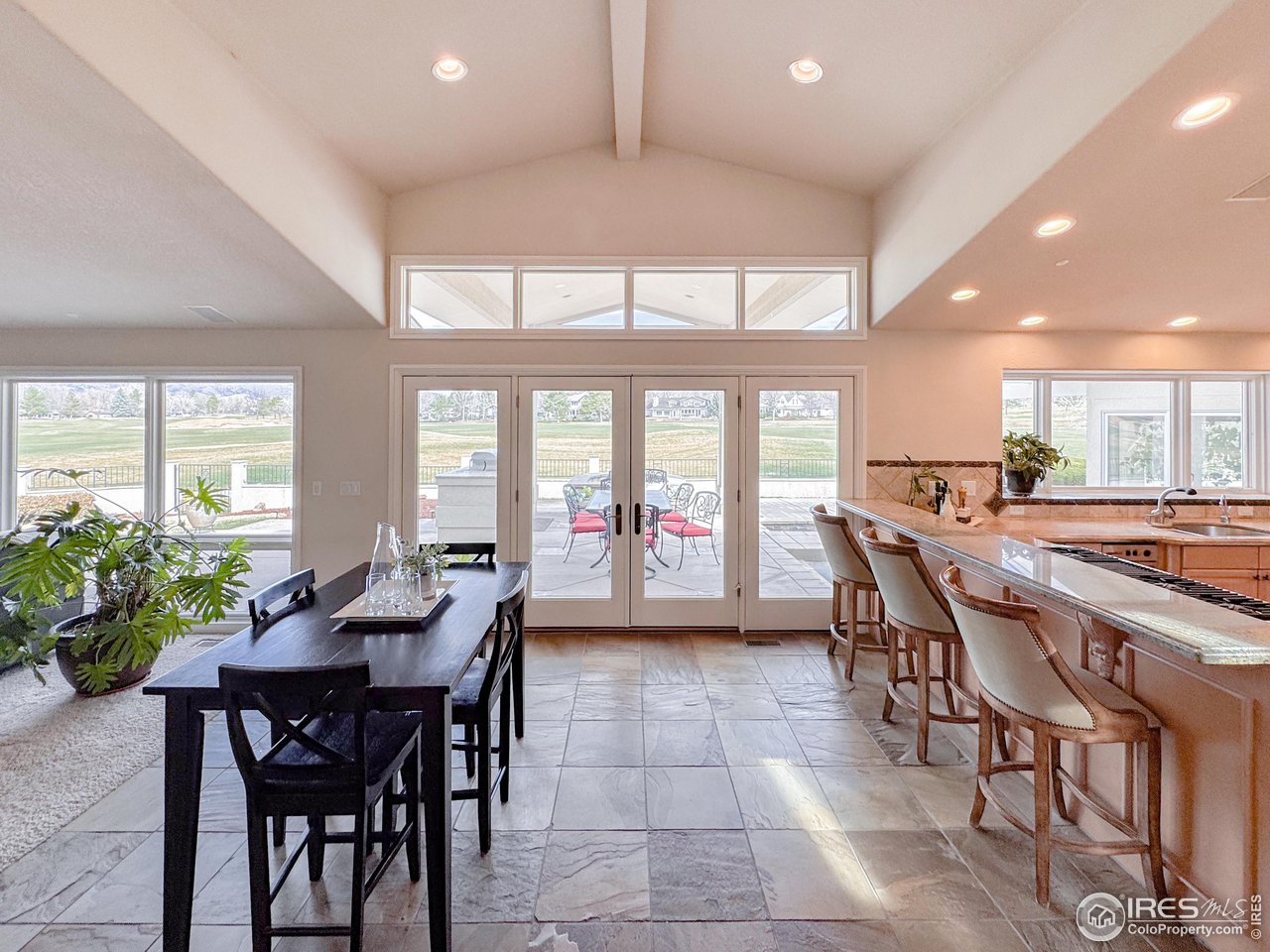 7155 Rustic Trail Boulder, CO 80301 - Photo 13 of 40 a dining area with a large window table and chairs