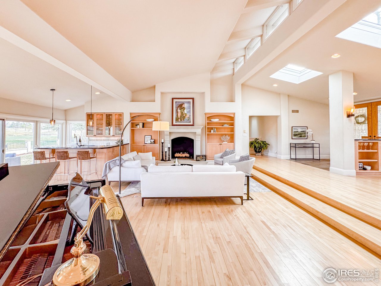 7155 Rustic Trail Boulder, CO 80301 - Photo 19 of 40 a living room with furniture and a wooden floor