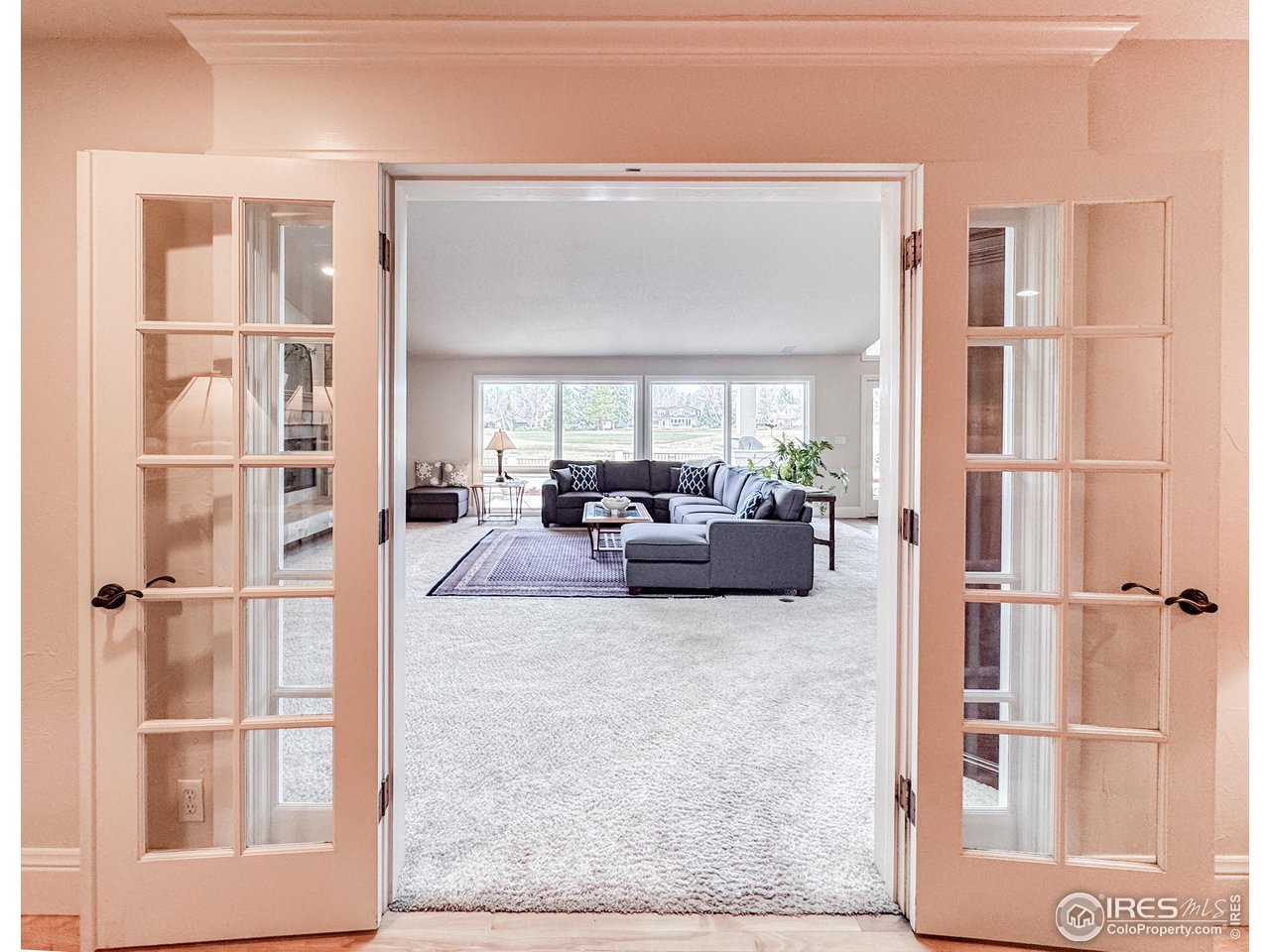 7155 Rustic Trail Boulder, CO 80301 - Photo 20 of 40 a living room with furniture and a large window