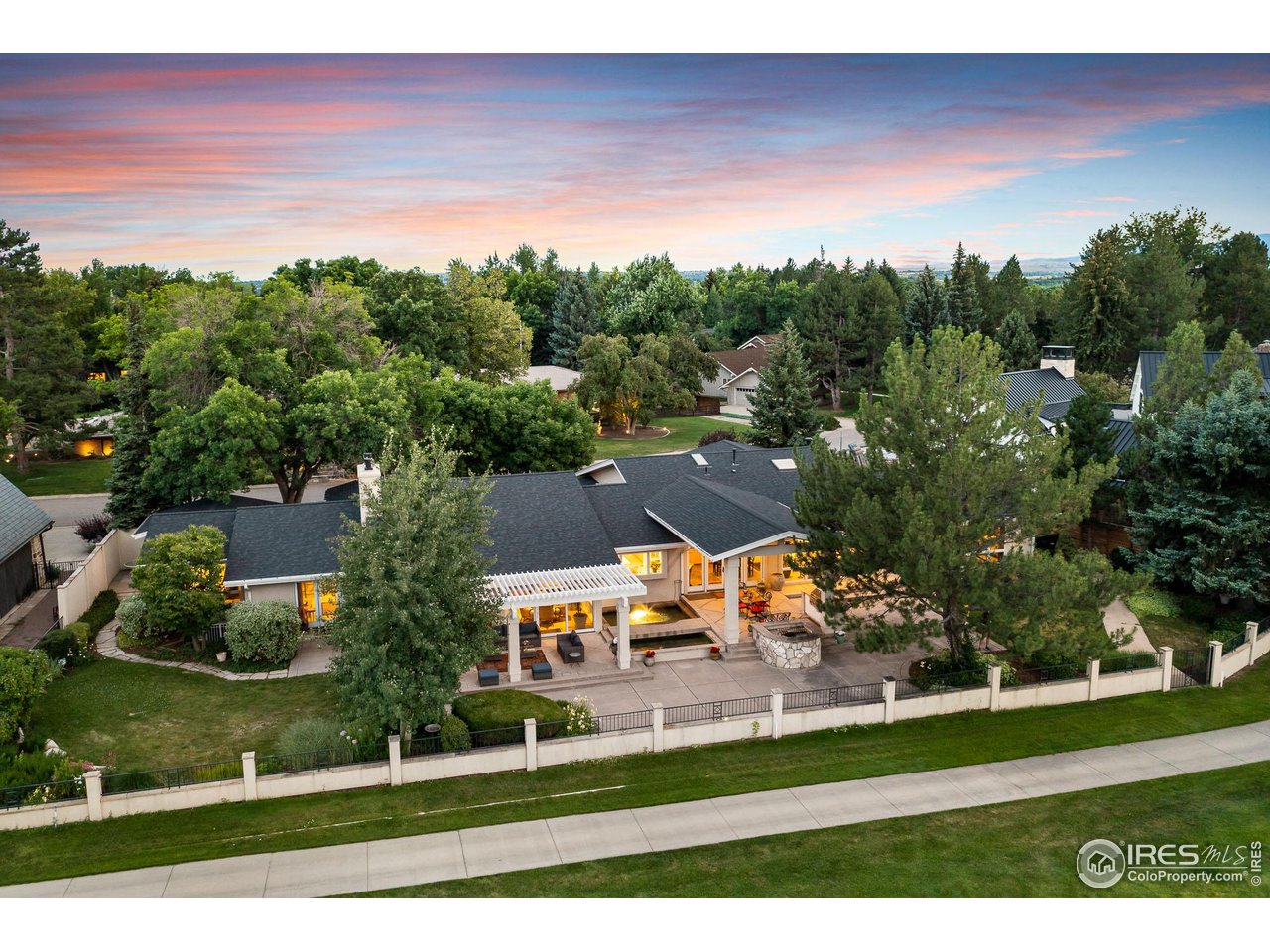 7155 Rustic Trail Boulder, CO 80301 - Photo 2 of 40 an aerial view of a house with a yard