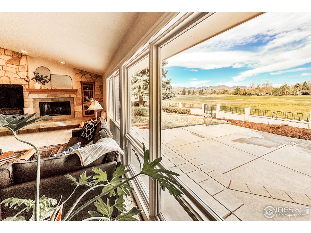 7155 Rustic Trail Boulder, CO 80301 - Photo 21 of 40 a view of a terrace with furniture and floor to ceiling window