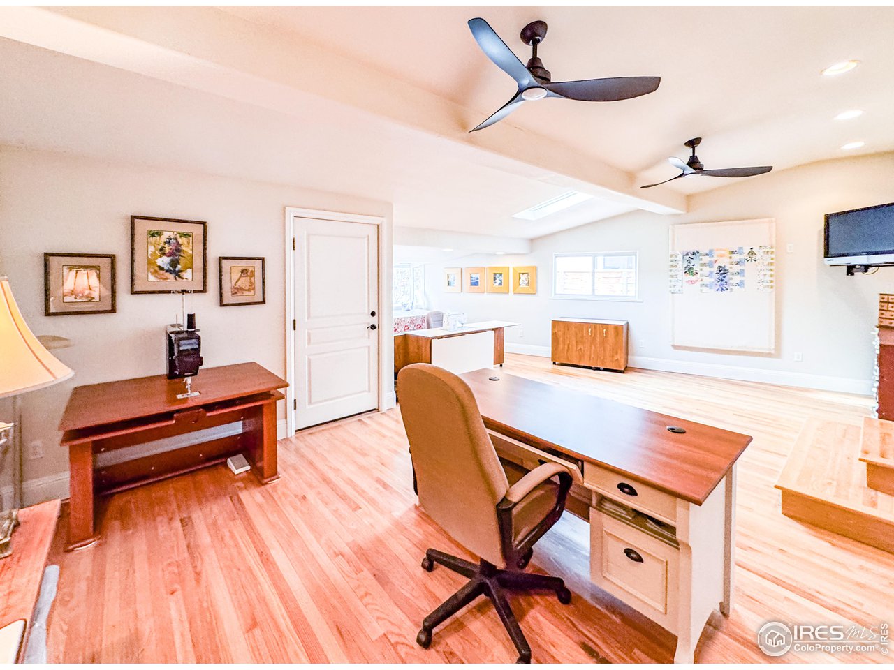 7155 Rustic Trail Boulder, CO 80301 - Photo 22 of 40 a living room with furniture and wooden floor