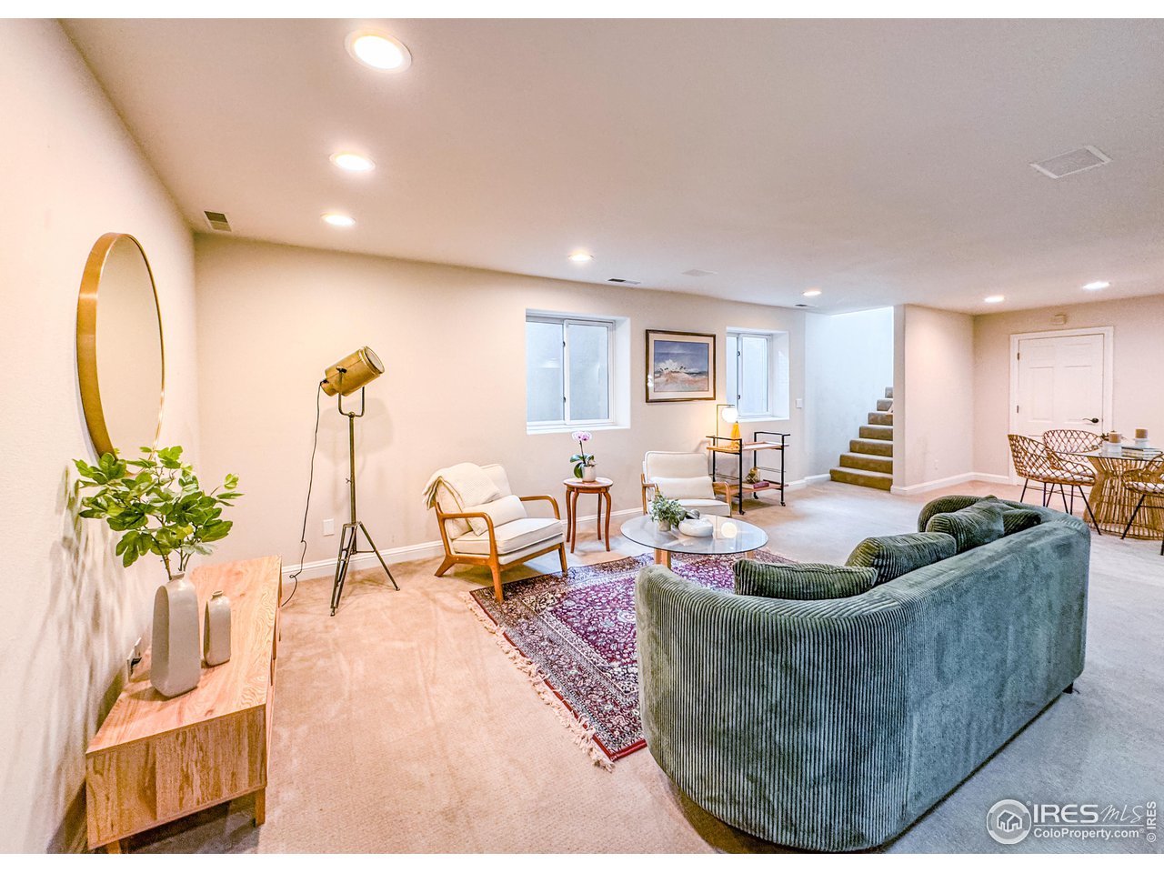 7155 Rustic Trail Boulder, CO 80301 - Photo 27 of 40 a living room with furniture kitchen view and a potted plant