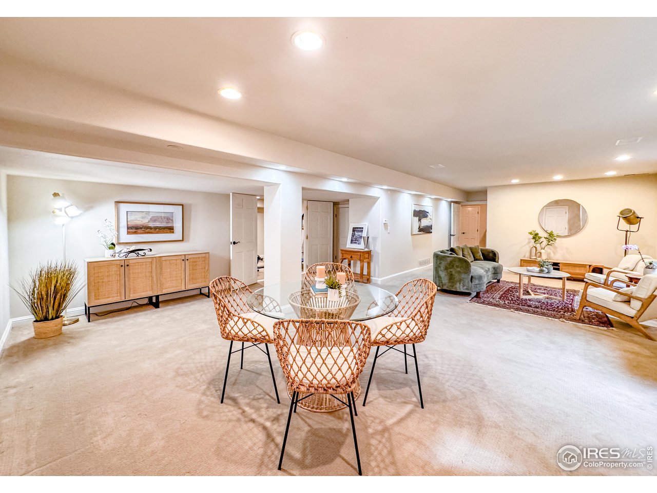 7155 Rustic Trail Boulder, CO 80301 - Photo 28 of 40 a dining room with furniture and a livingroom view