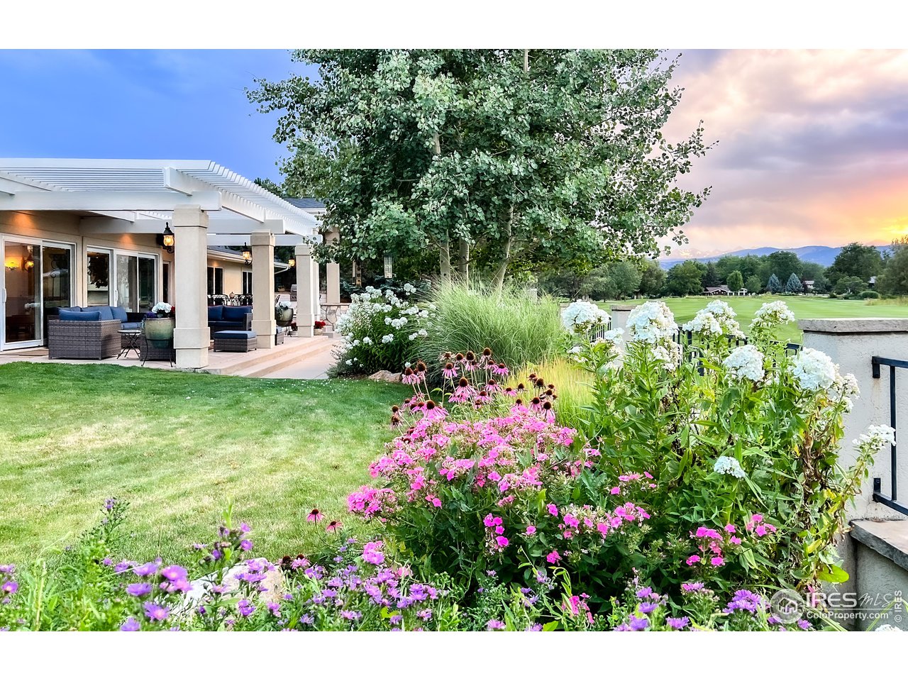 7155 Rustic Trail Boulder, CO 80301 - Photo 32 of 40 a view of a house with a garden and pathway