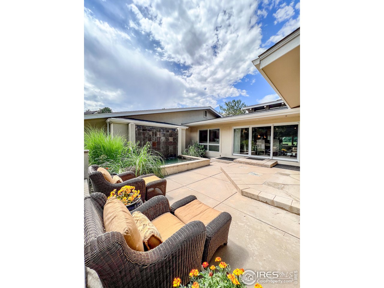 7155 Rustic Trail Boulder, CO 80301 - Photo 33 of 40 a view of house with swimming pool and furniture