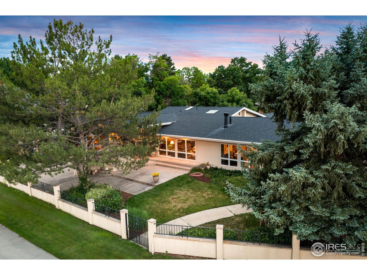7155 Rustic Trail Boulder, CO 80301 - Photo 35 of 40 a view of a big yard with potted plants and large tree