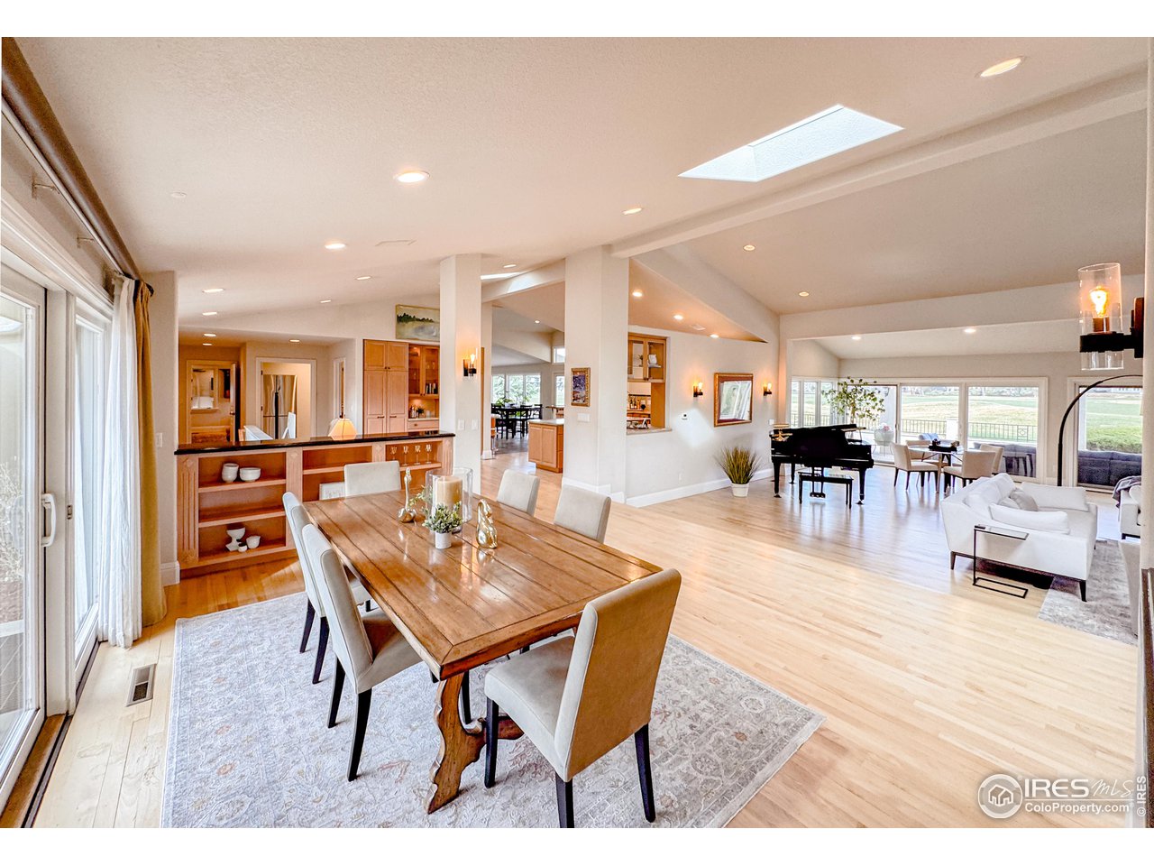 7155 Rustic Trail Boulder, CO 80301 - Photo 37 of 40 a dining room with furniture and wooden floor