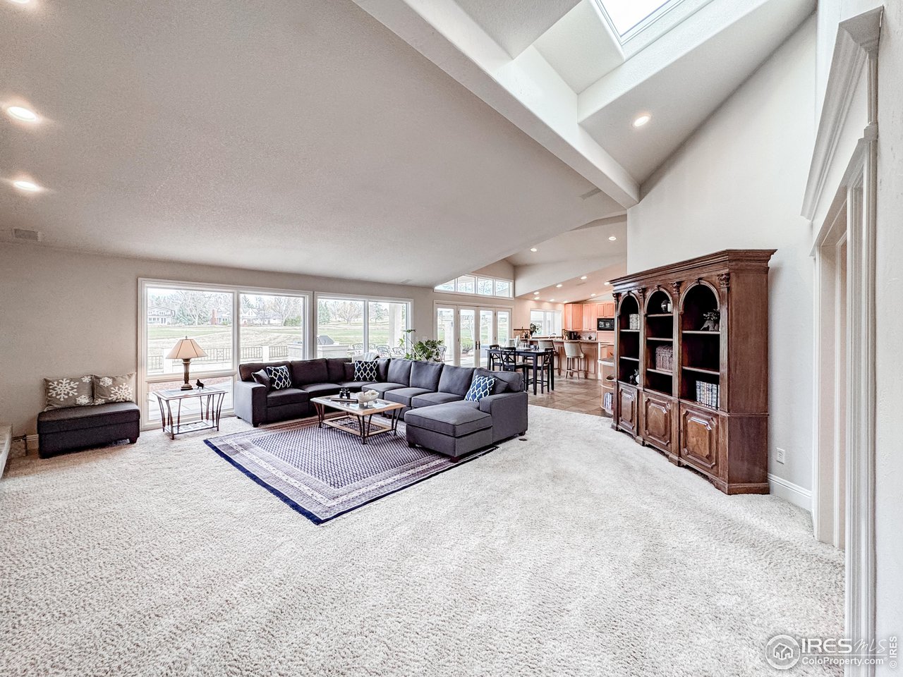 7155 Rustic Trail Boulder, CO 80301 - Photo 39 of 40 a living room with furniture and a flat screen tv
