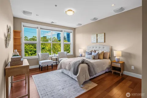 a bed room with a bed and a table