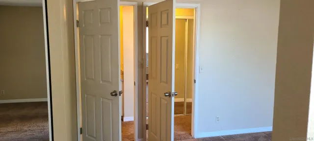 a bathroom with a shower and a bath tub