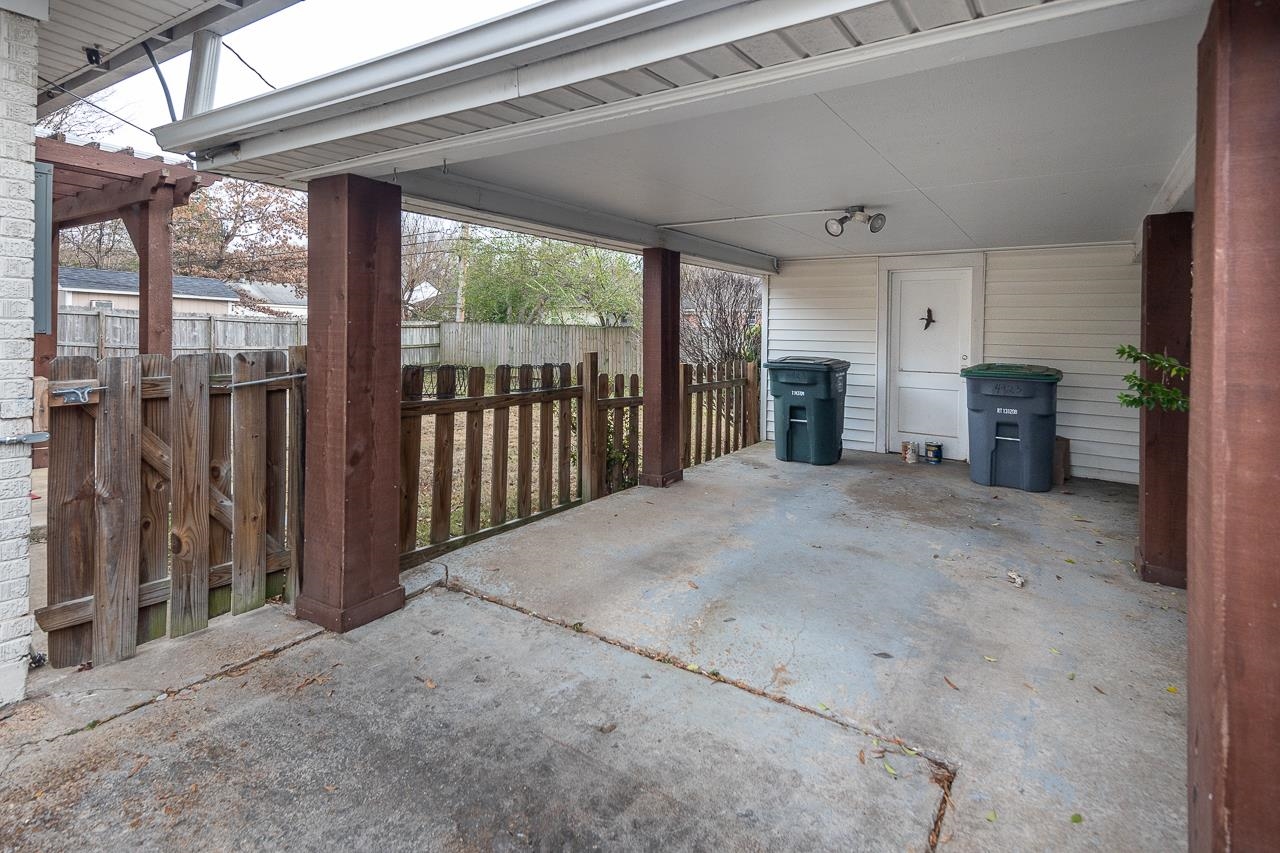 4923 Kaye Road Memphis, TN 38117 - Photo 21 of 21 a view of a porch with furniture and floor to ceiling window