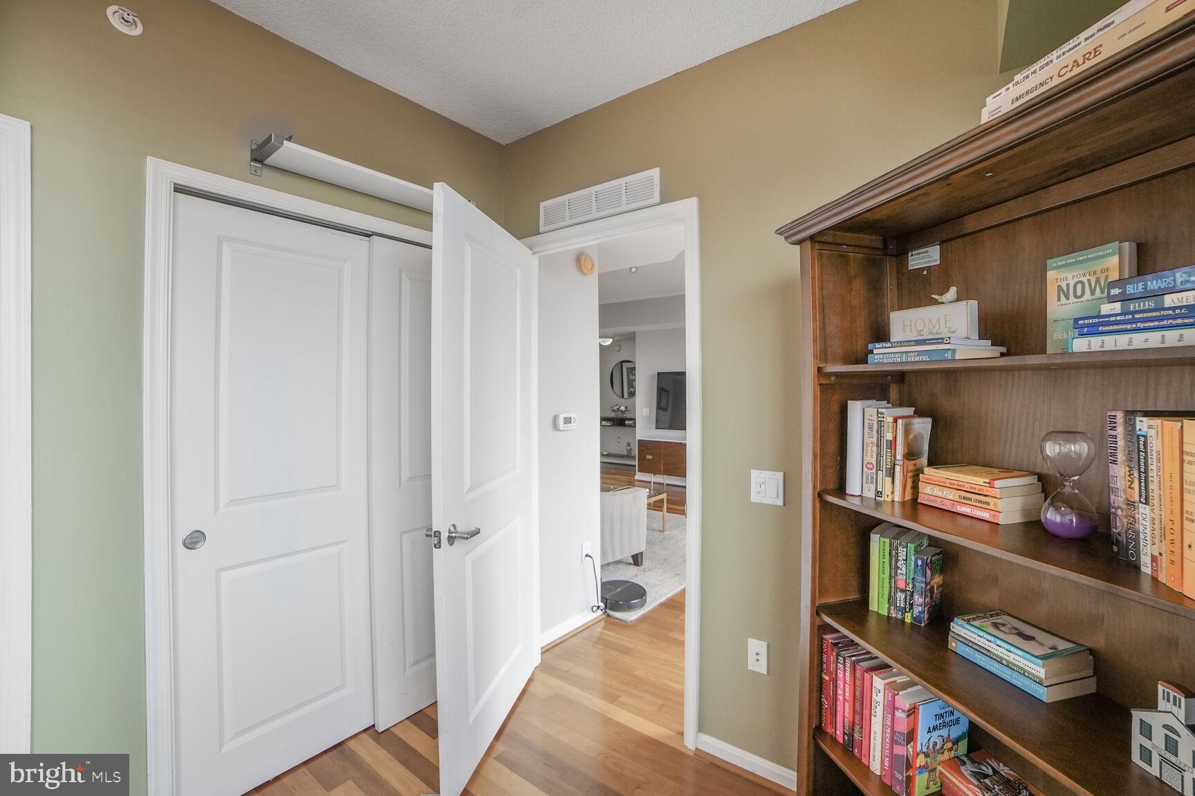 930 Wayne Avenue, Unit 708 Silver Spring, MD 20910 - Photo 24 of 35 a view of an entryway with bedroom and workspace