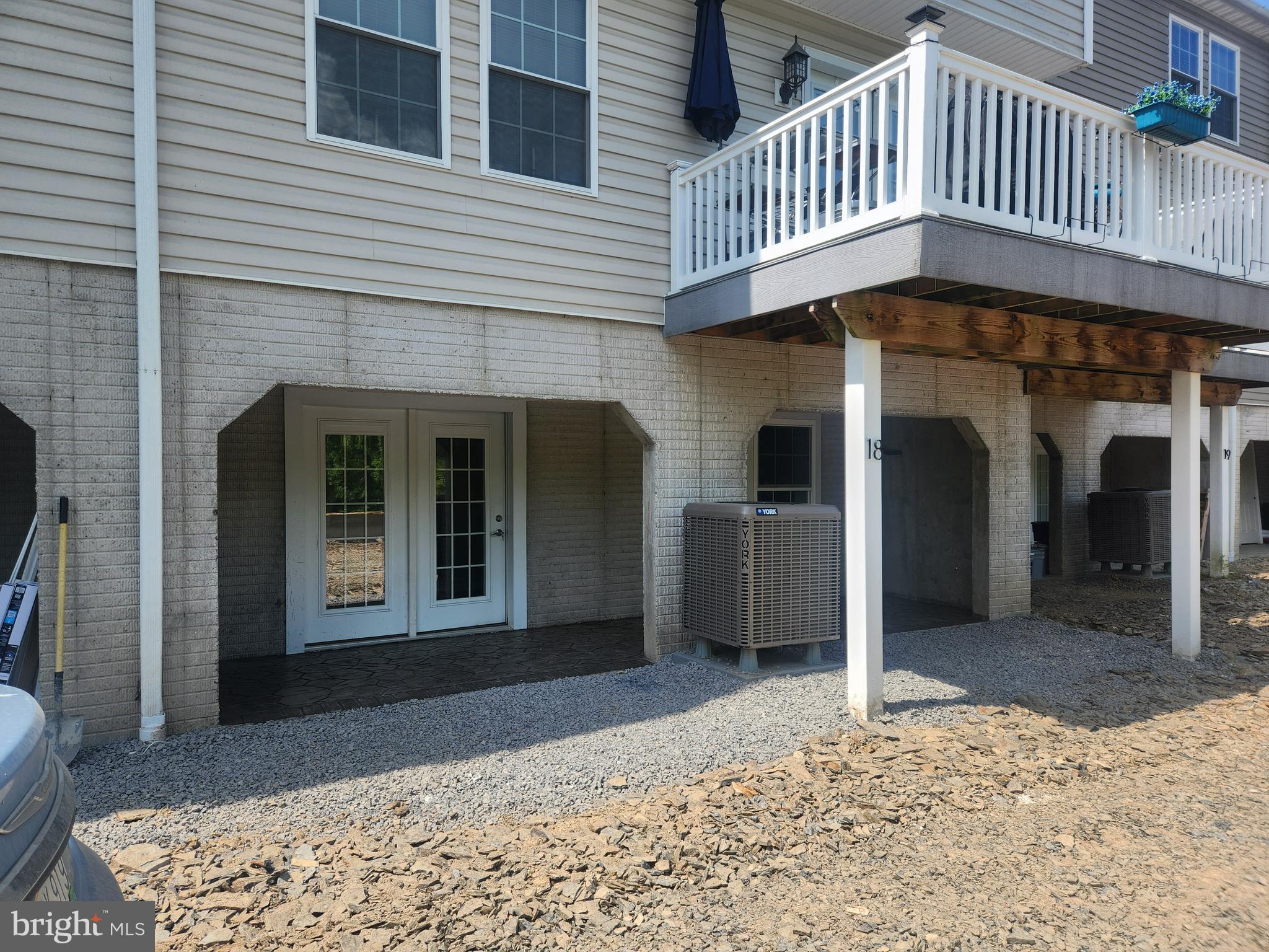 65 Woods Edge Road, Unit 18 Fort Ashby, WV 26719 - Photo 1 of 12 a front view of a house