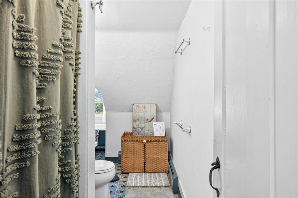 4 South Highland Road, Unit C Truro, MA 02666 - Photo 12 of 21 a bathroom with a toilet and shower