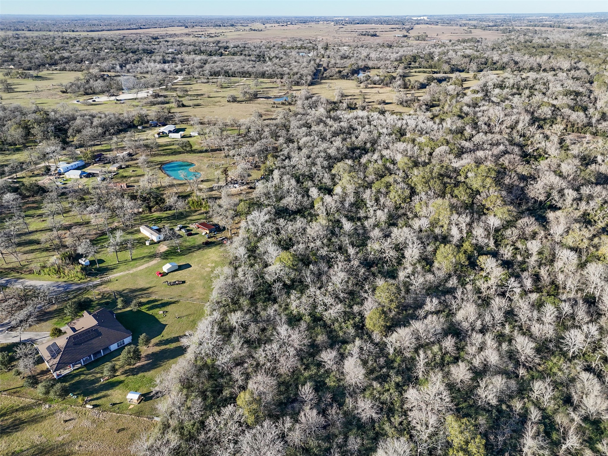 Tbd Tbd Jozwiack Prairie View Prairie View, TX 77445 - Photo 10 of 10 an aerial view of house with yard and mountain view in back