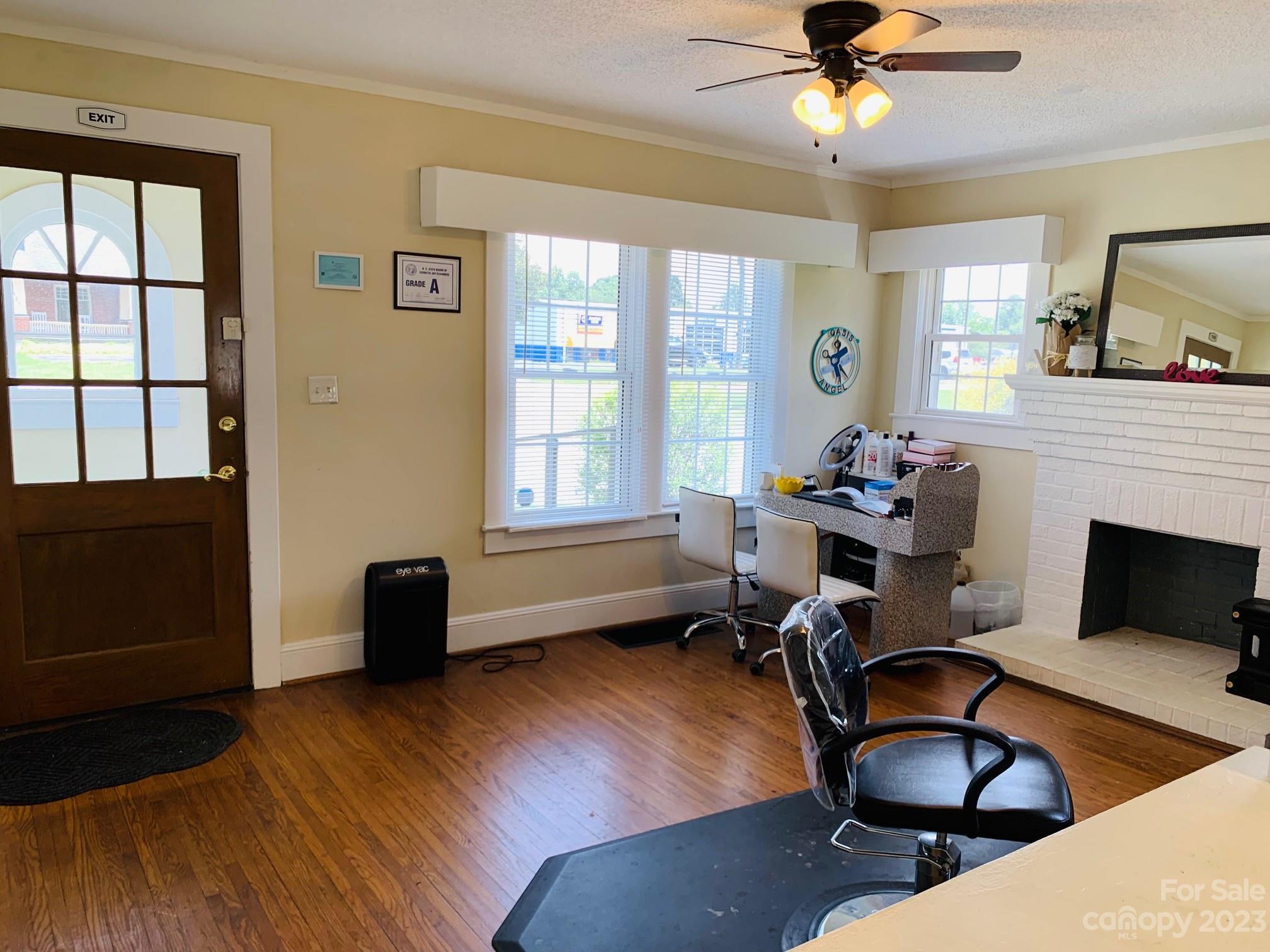 624 Main Street Hudson, NC 28638 - Photo 13 of 17 a living room with furniture and wooden floor