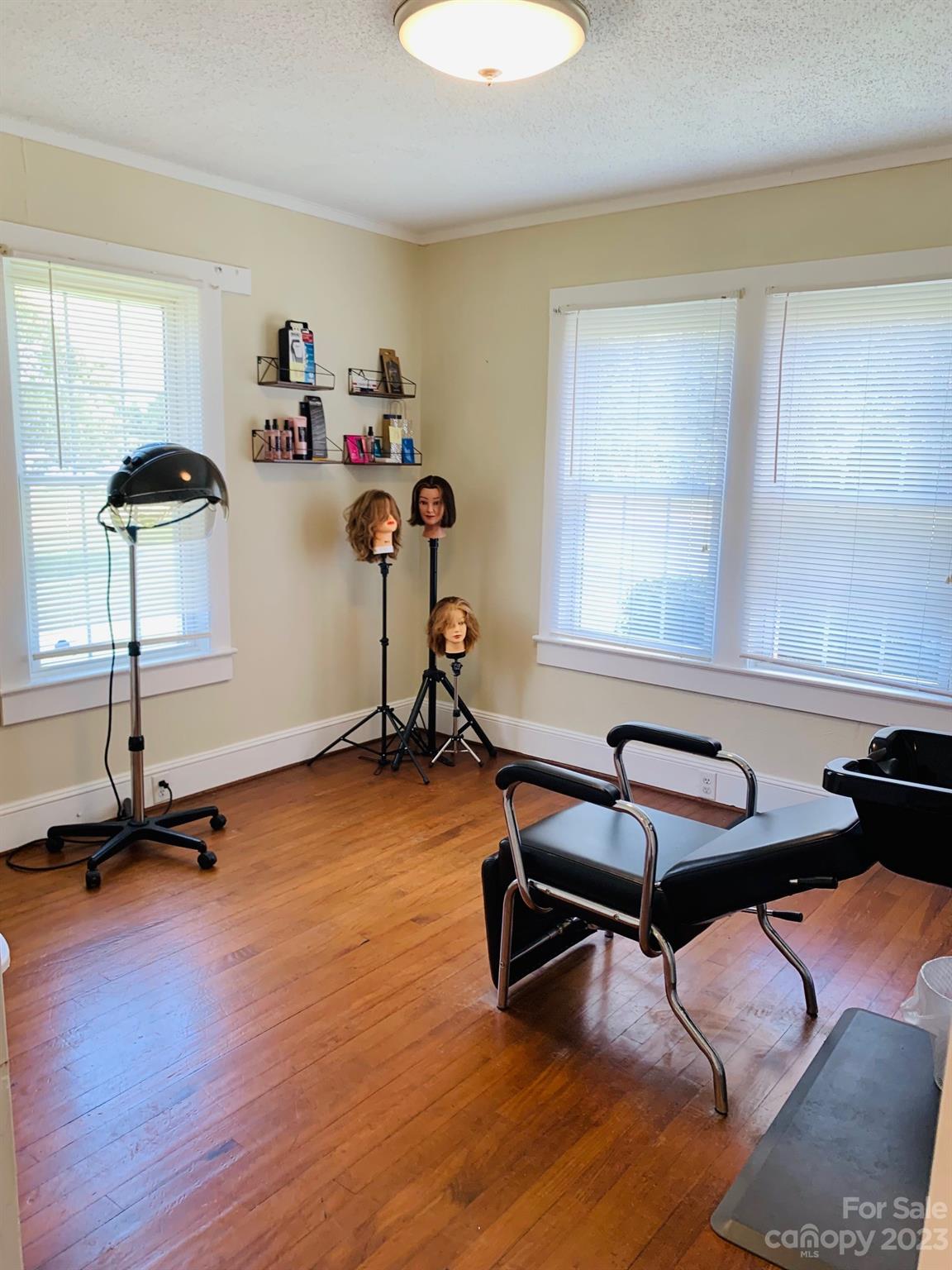 624 Main Street Hudson, NC 28638 - Photo 15 of 17 a room with gym equipment and a window