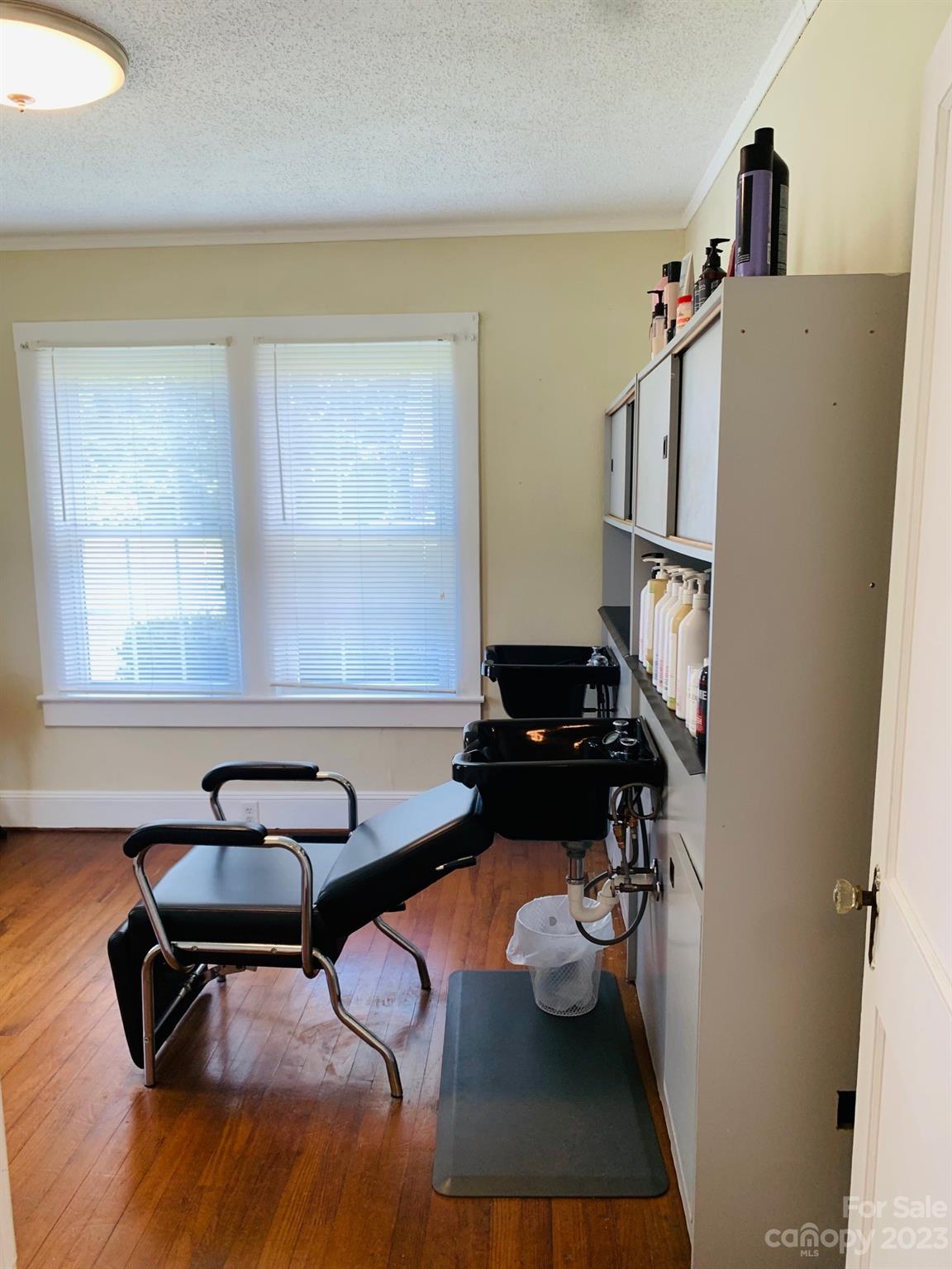624 Main Street Hudson, NC 28638 - Photo 16 of 17 a living room with furniture and a window