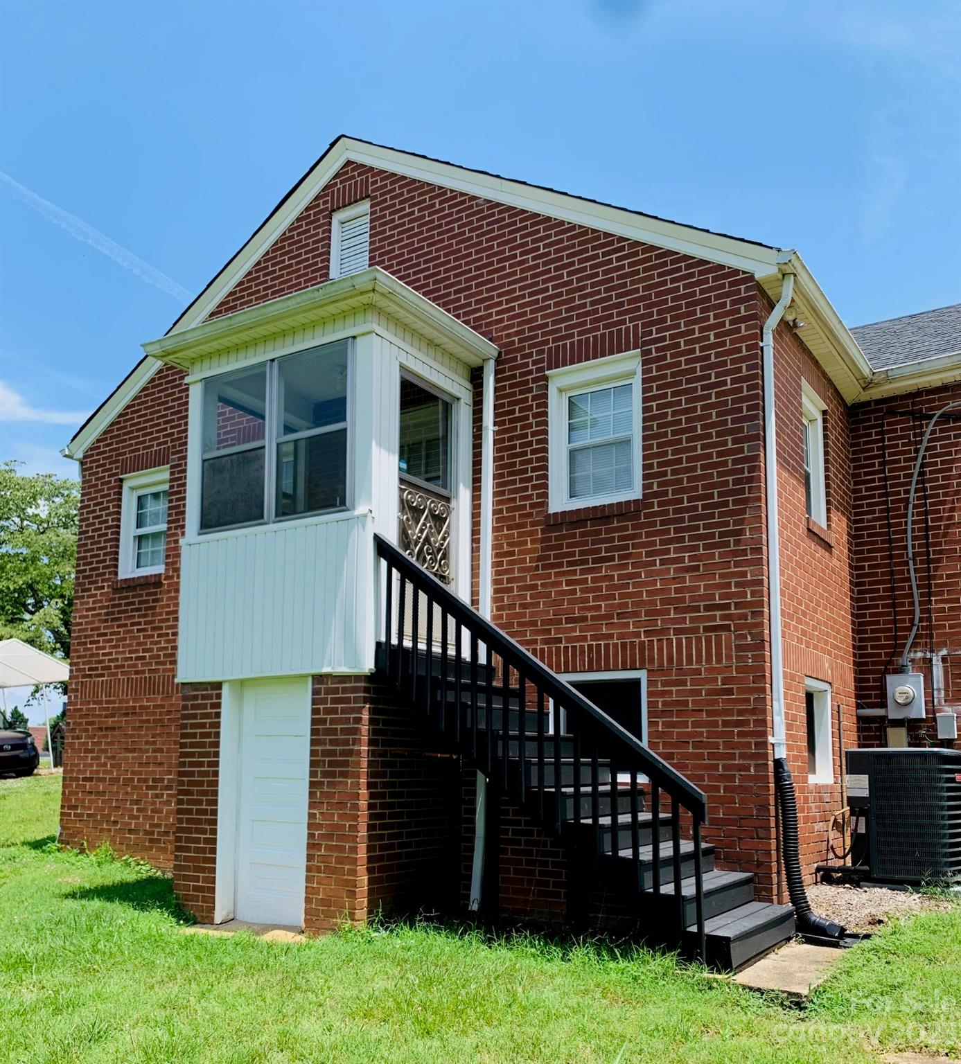 624 Main Street Hudson, NC 28638 - Photo 5 of 17 a view of front of house with a yard