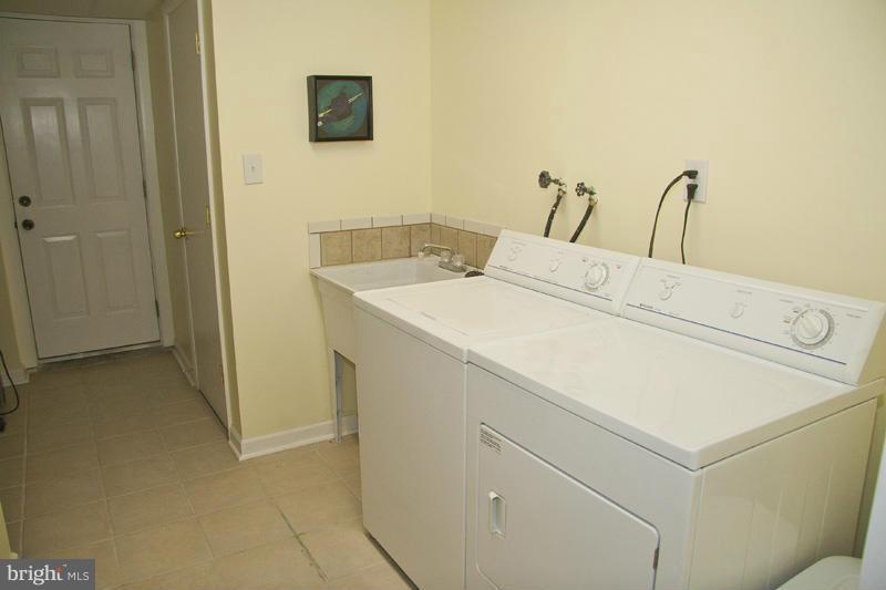 1807 Trenleigh Road Baltimore, MD 21234 - Photo 25 of 29 Laundry room tiled floor