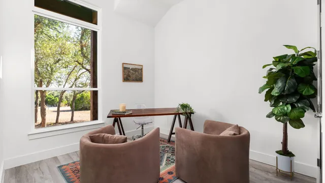 a kitchen with stainless steel appliances a sink stove and cabinets
