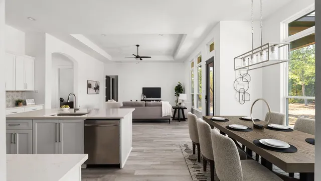 a kitchen with a sink and a refrigerator