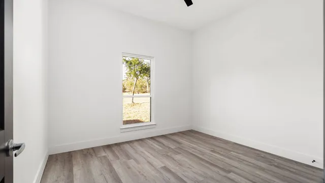 a bathroom with a sink a toilet a shower and bathtub