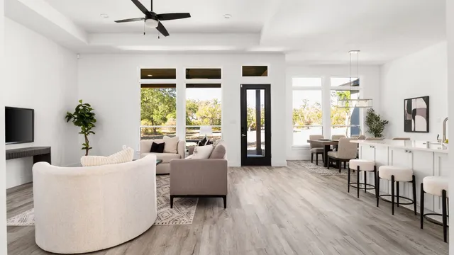 a bedroom with a large bed and a large window