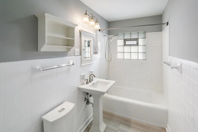 a bathroom with a sink and a bathtub