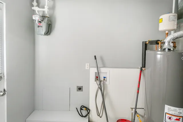 a bathroom with a shower and a mirror