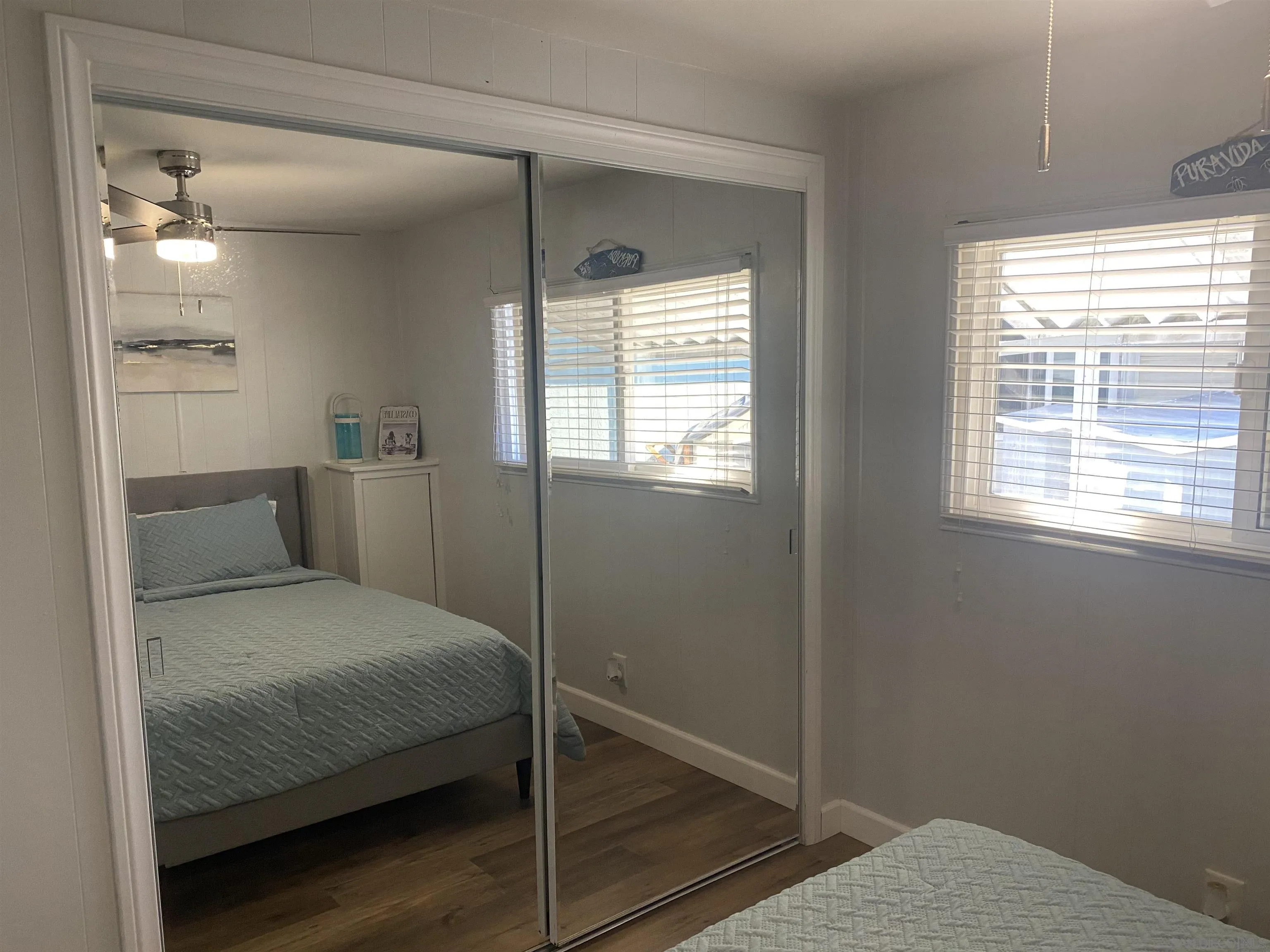 900 North Cleveland Street, Unit 33 Oceanside, CA 92054 - Photo 13 of 23 a bedroom with a bed and a window