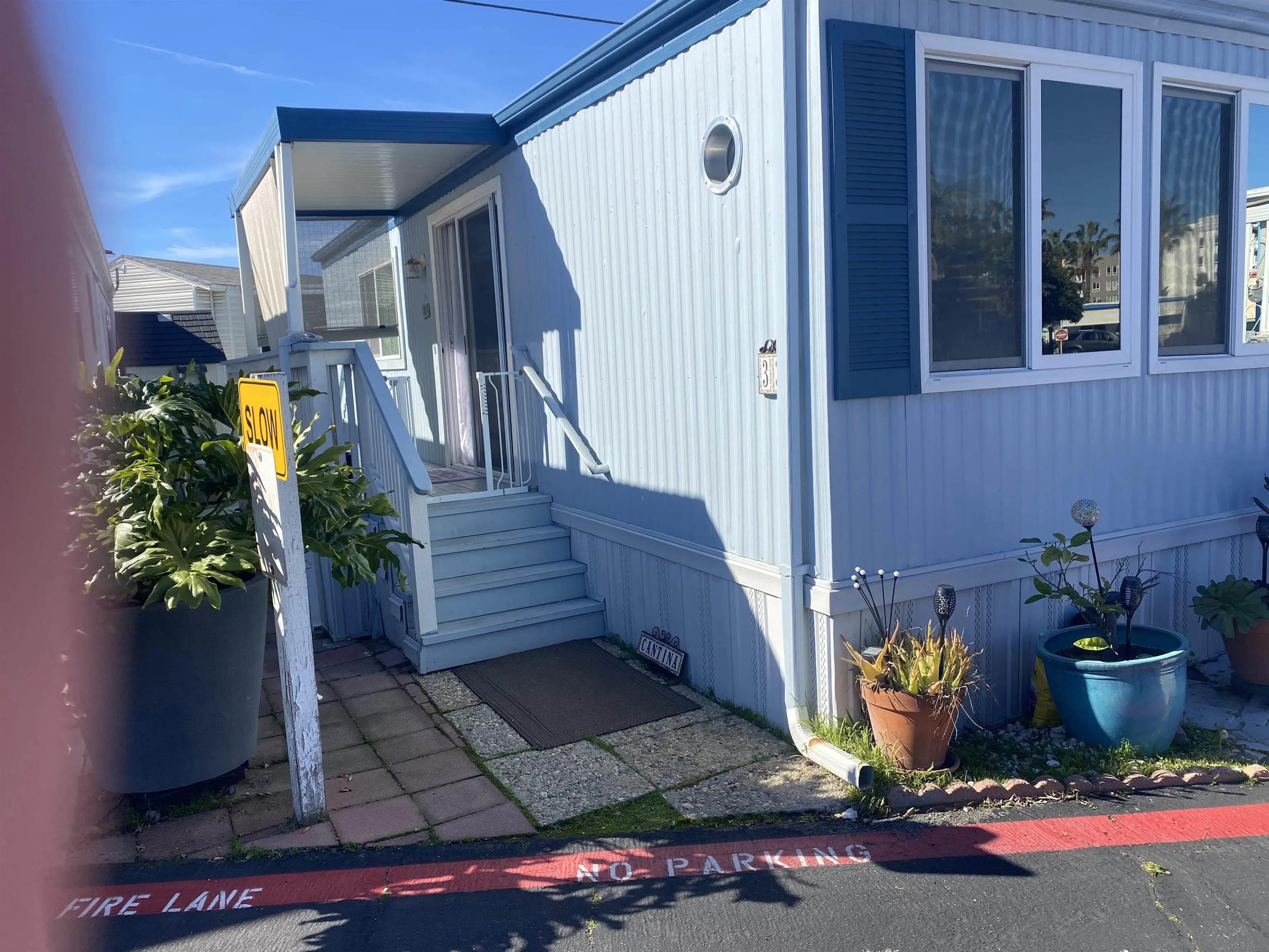 900 North Cleveland Street, Unit 33 Oceanside, CA 92054 - Photo 3 of 23 a view of stairs and potted plant