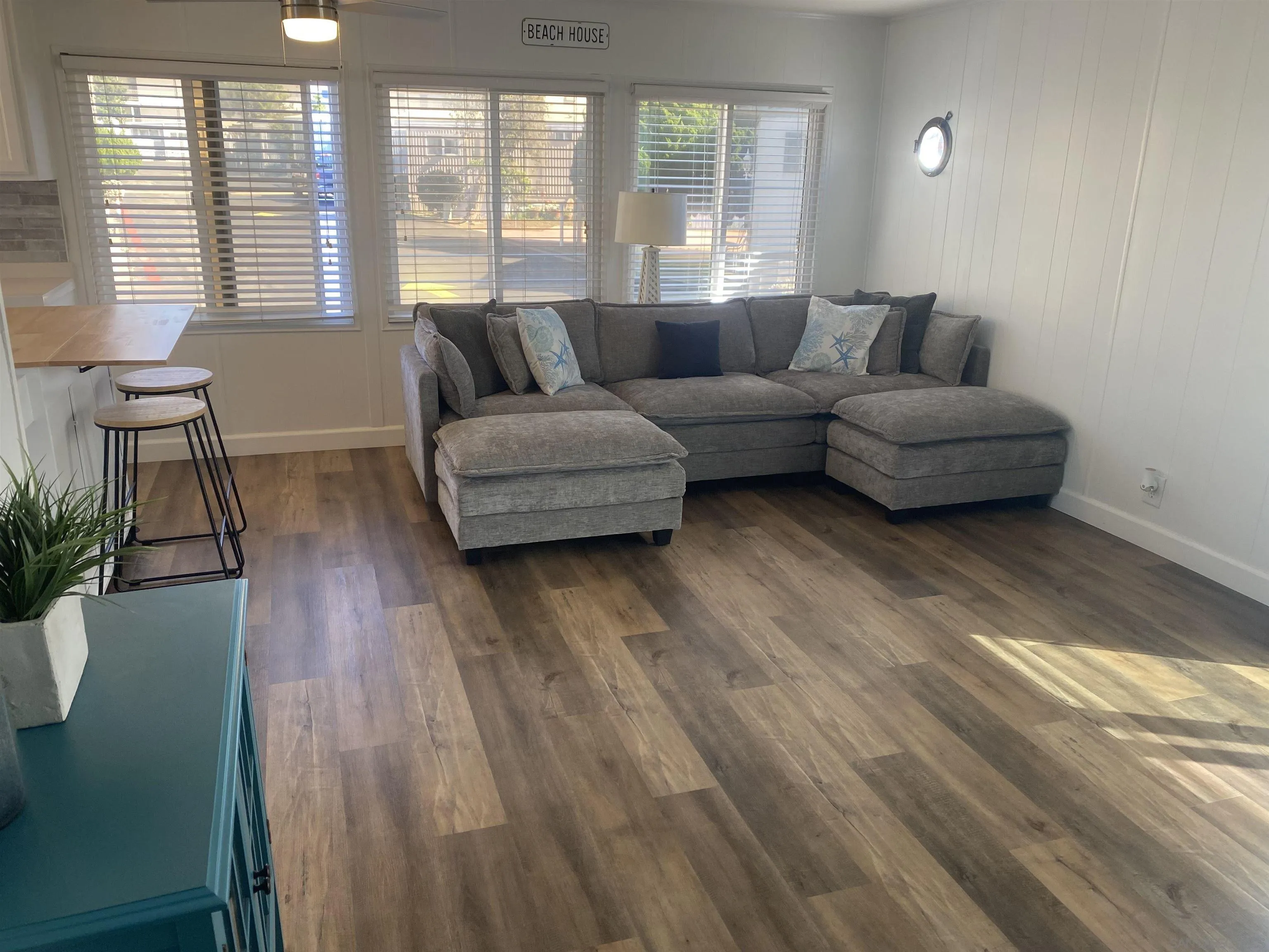 900 North Cleveland Street, Unit 33 Oceanside, CA 92054 - Photo 4 of 23 a living room with furniture and wooden floor